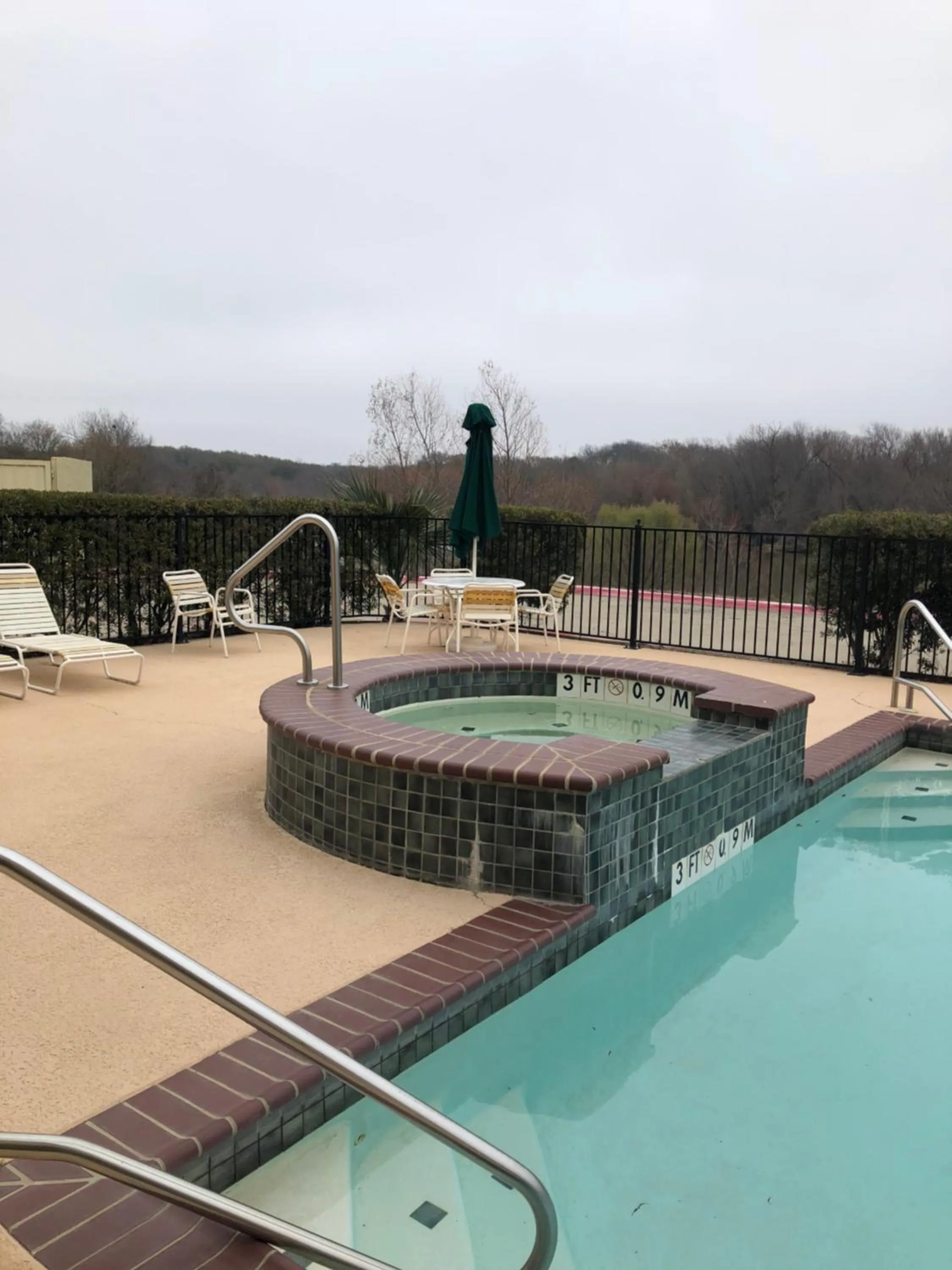 Swimming pool in Americas Best Value Inn - Gun Barrel City