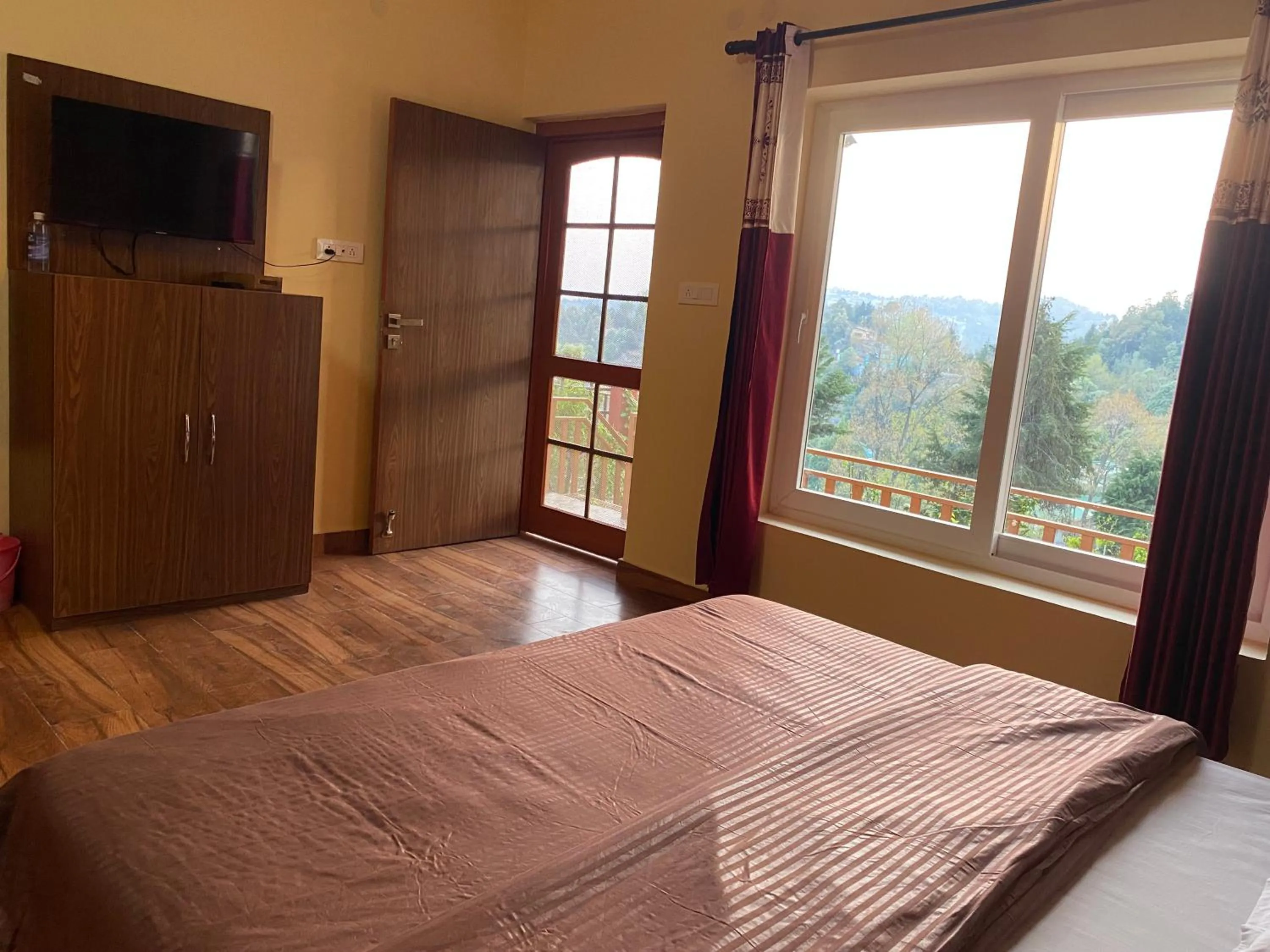 Bed in Khushi Cottage