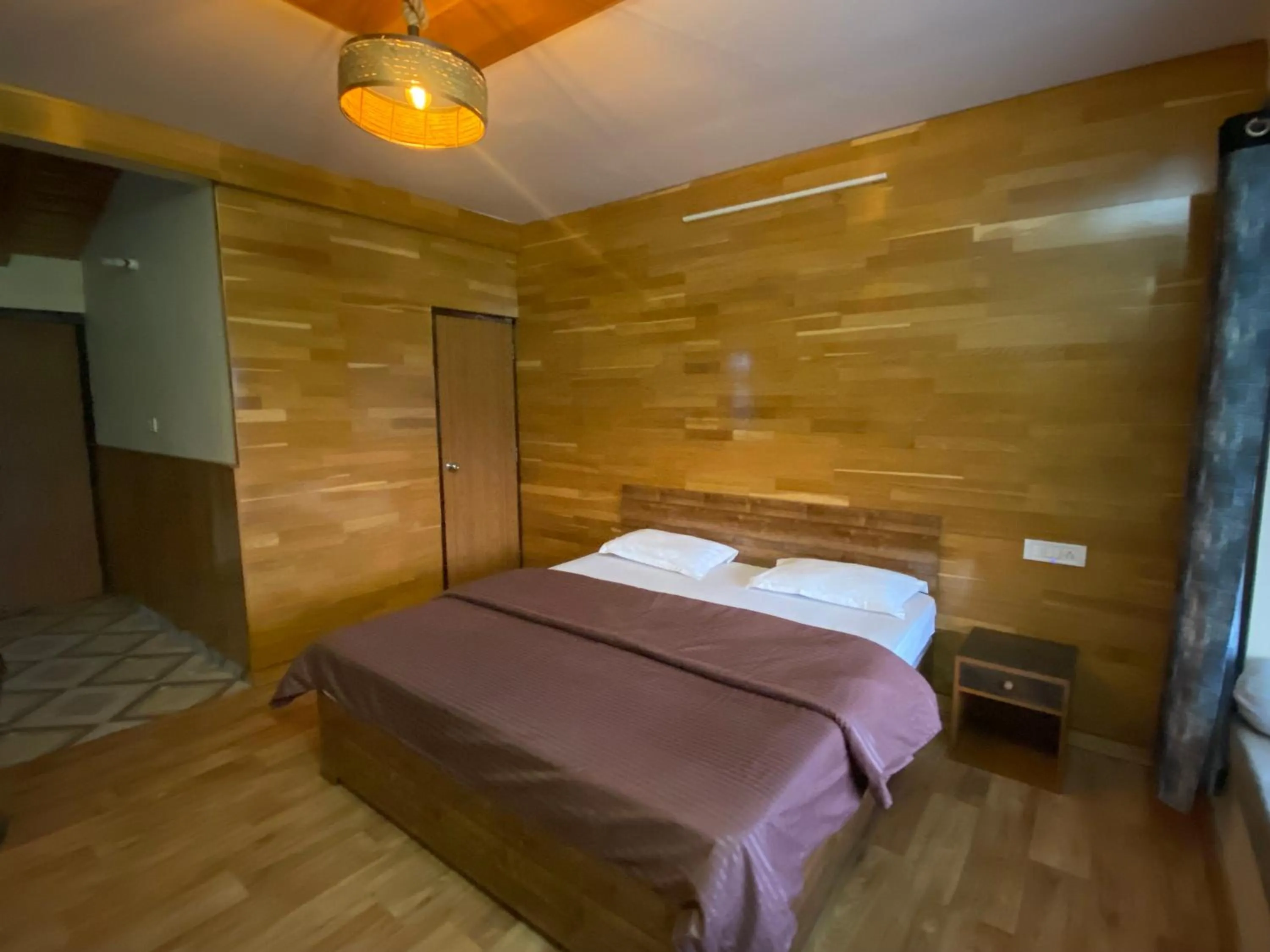 Bed in Khushi Cottage