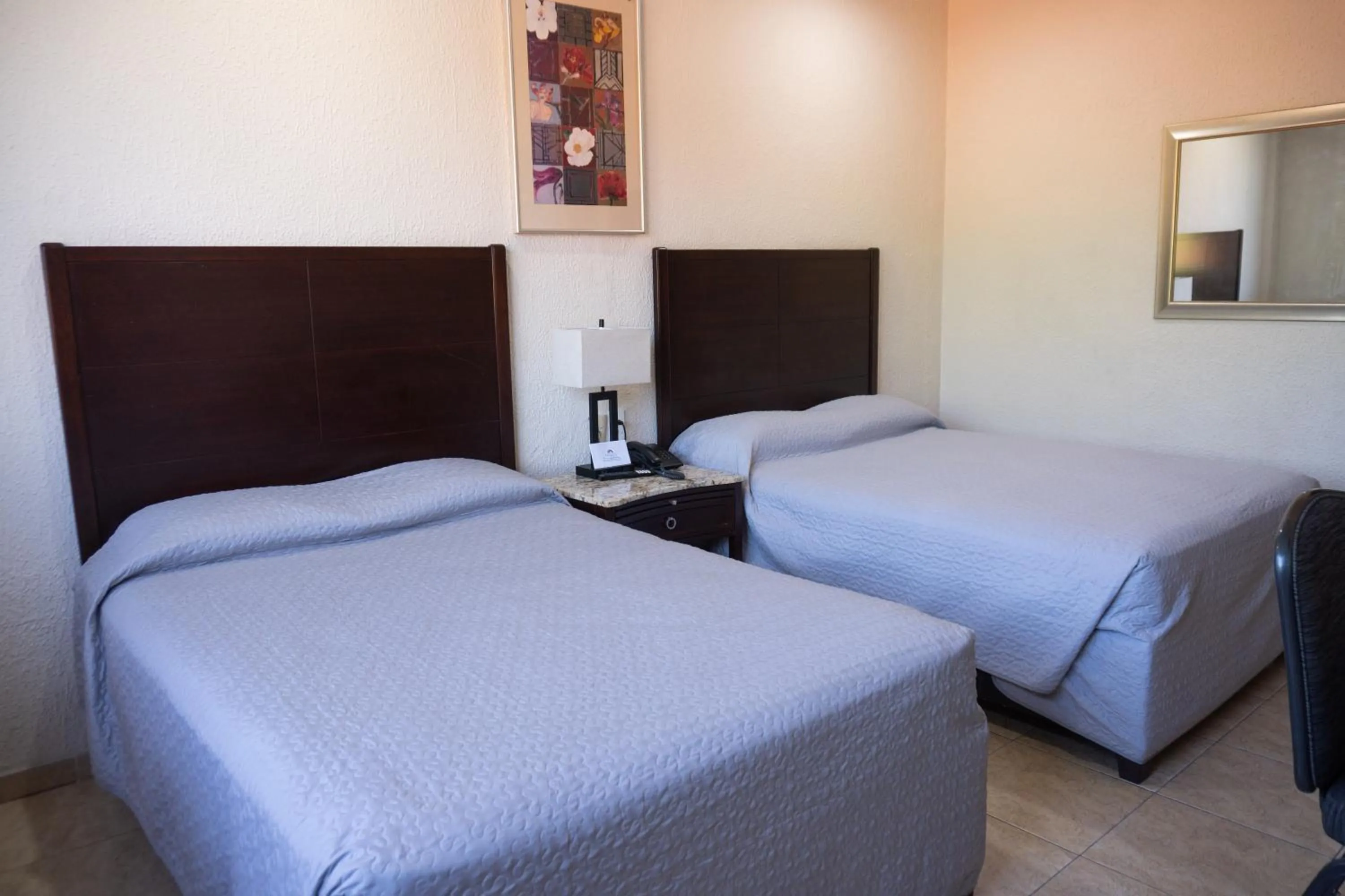 Bed in Hotel America Palacio