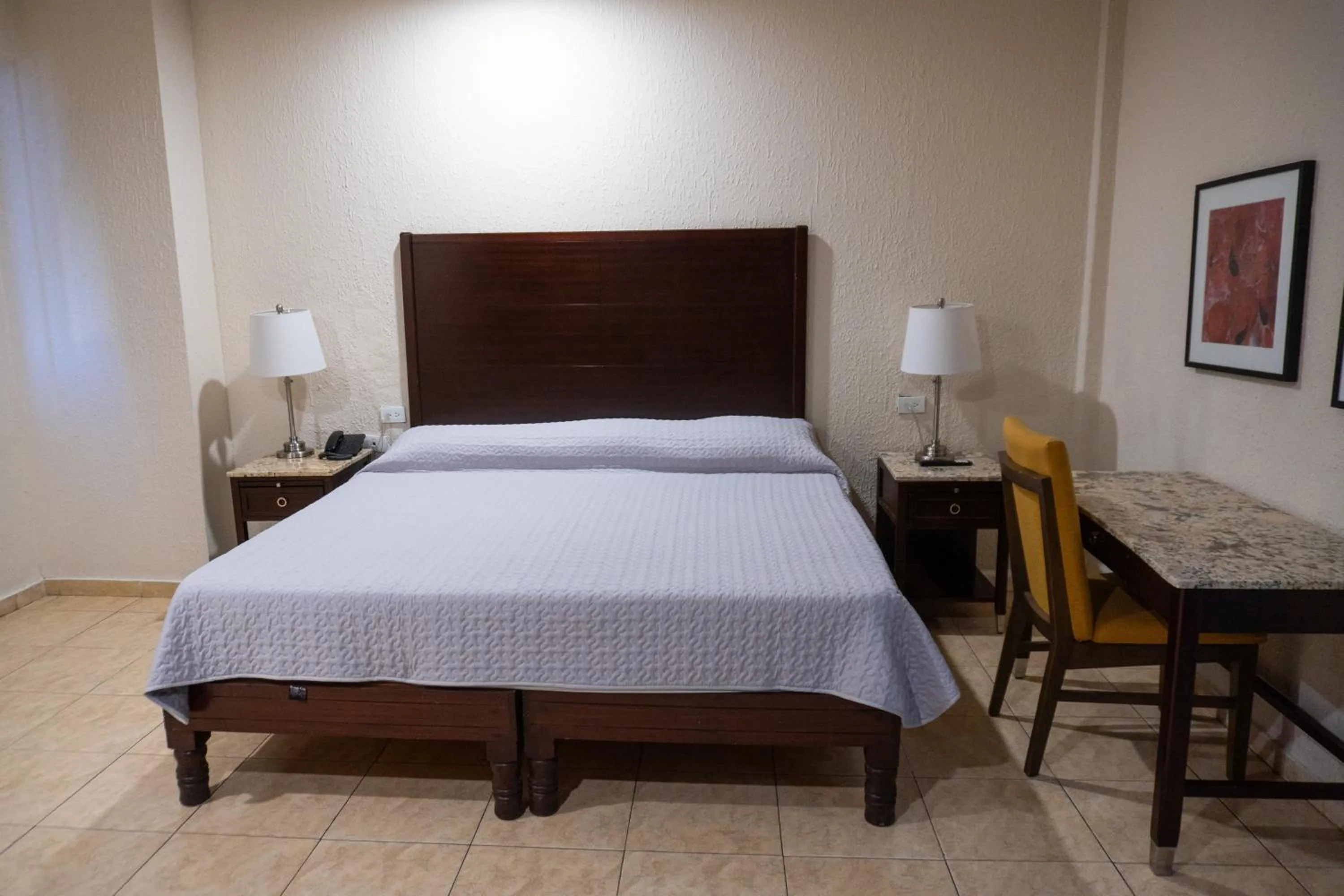 Bed in Hotel America Palacio