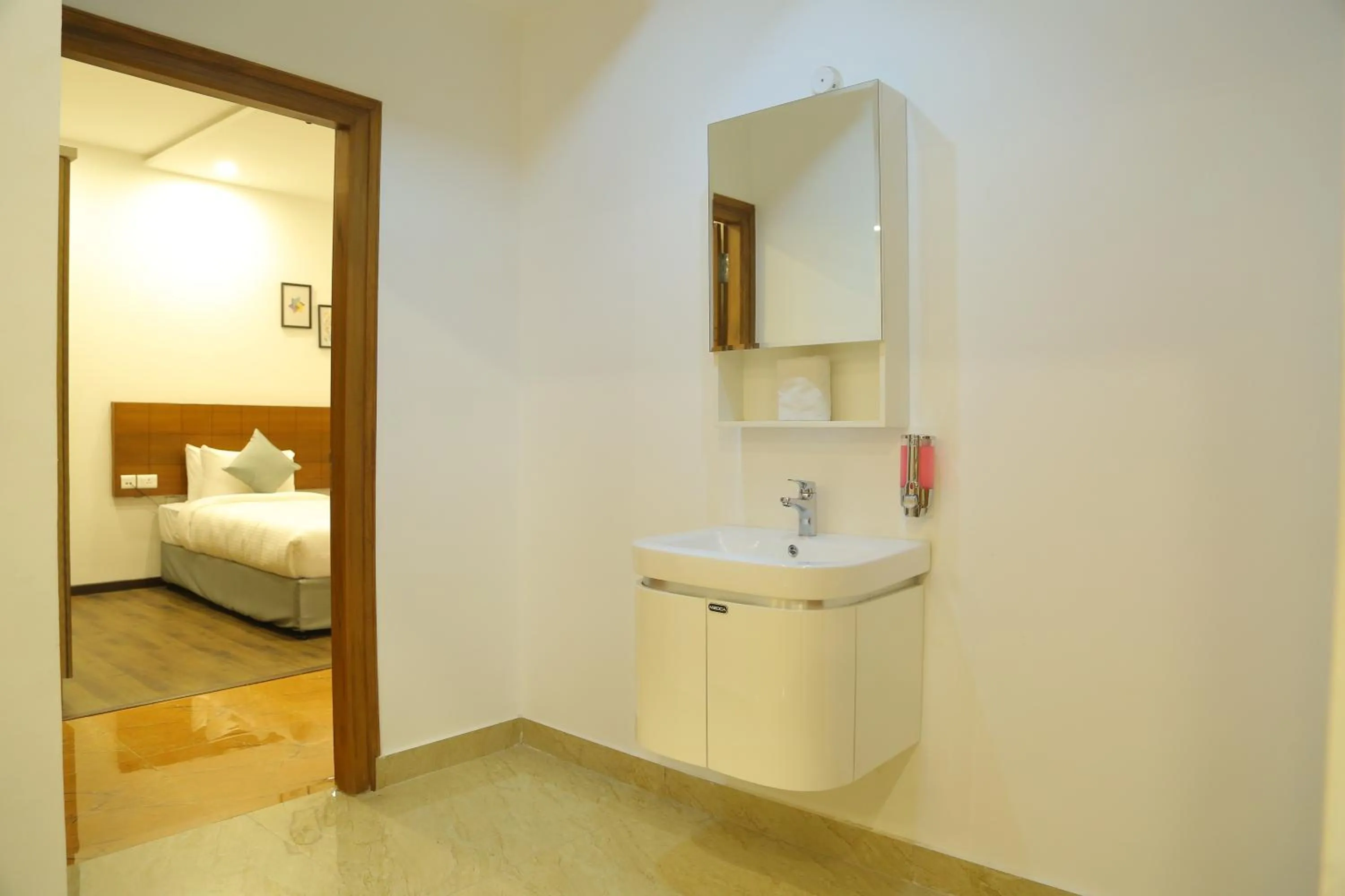 Bathroom, Bed in Aptly Premium Serviced Apartments - A BRAND UNIT OF SKYLA