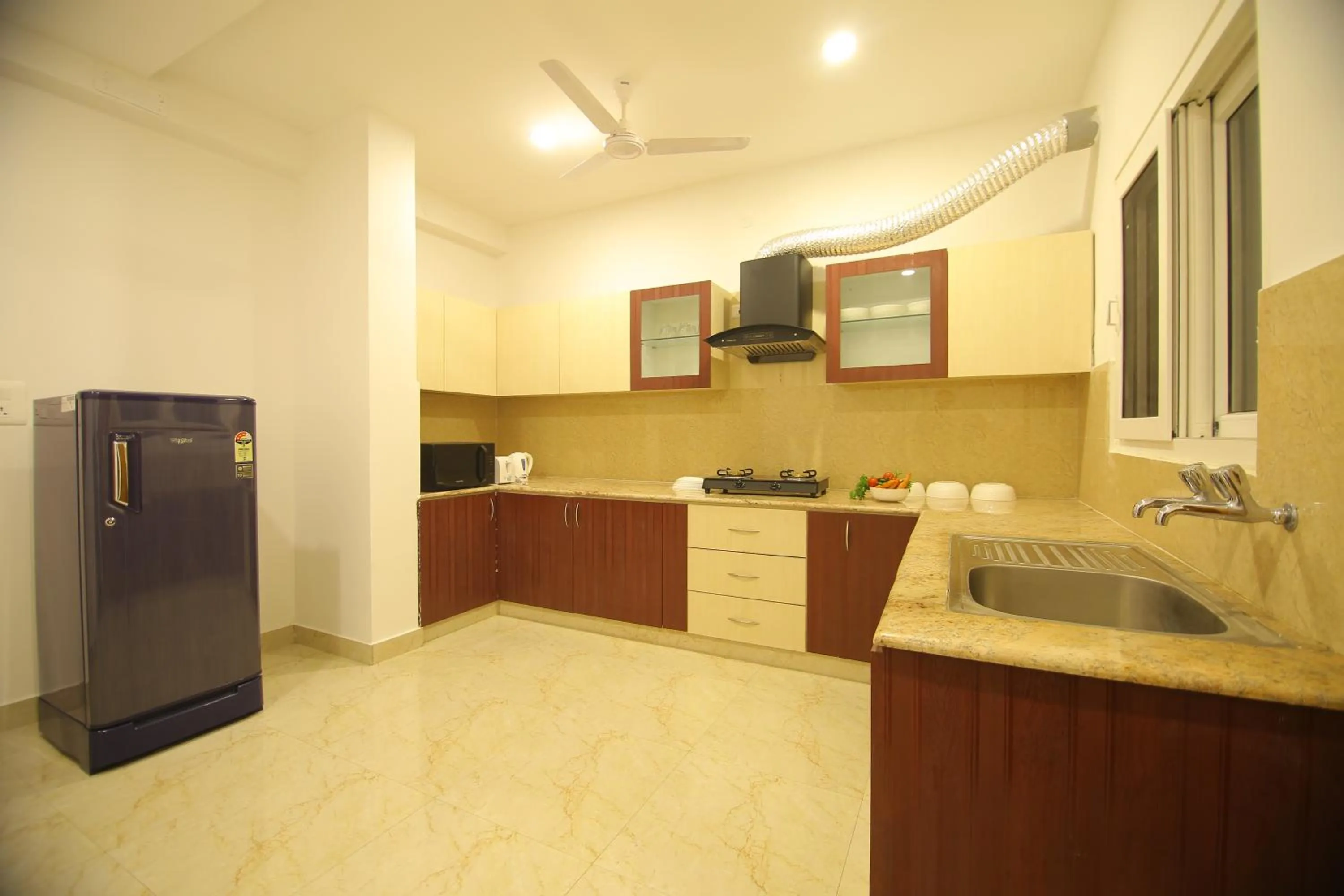 Kitchen or kitchenette in Aptly Premium Serviced Apartments - A BRAND UNIT OF SKYLA