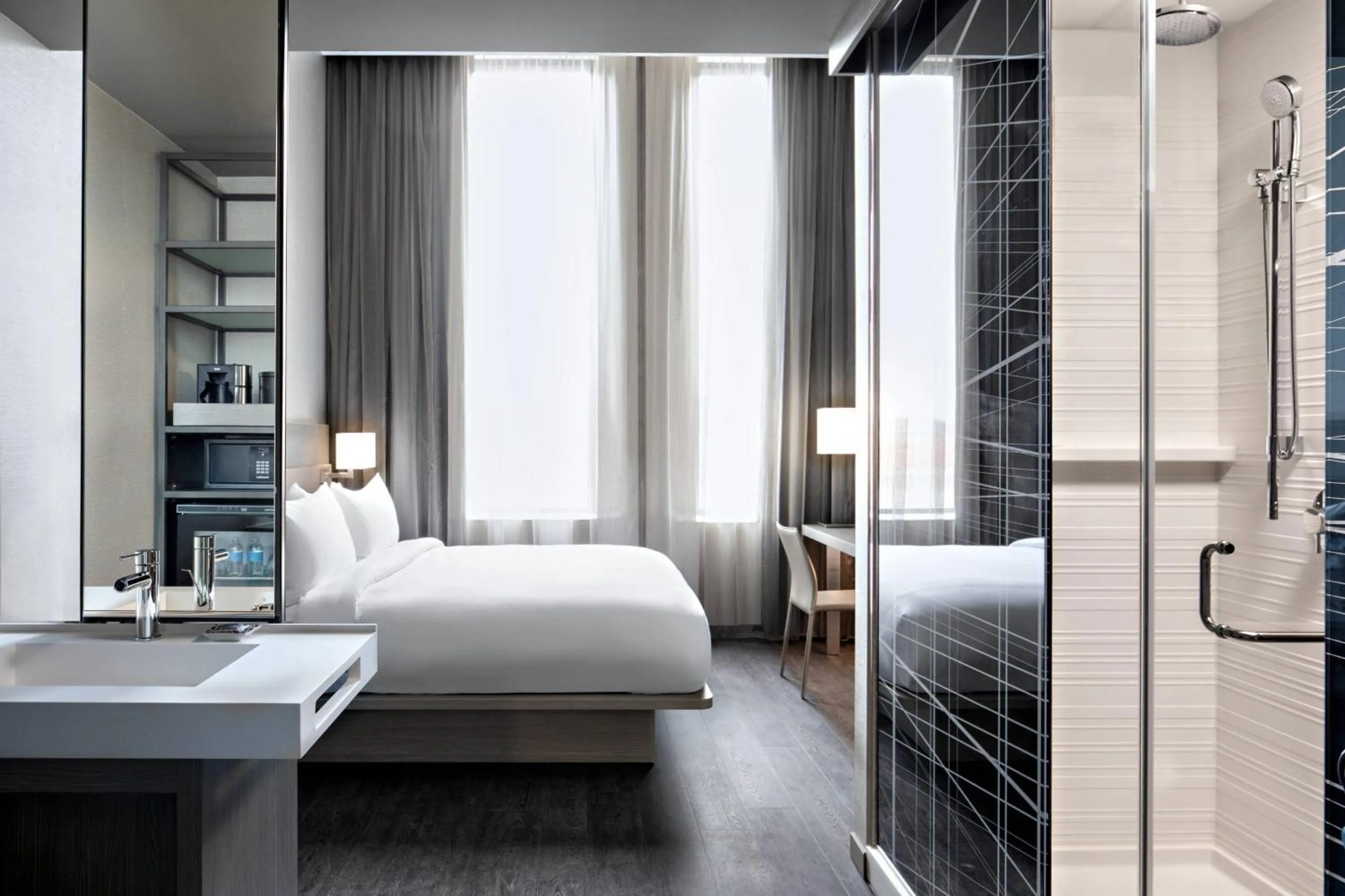 Bathroom, Bed in AC Hotel by Marriott Grand Rapids Downtown