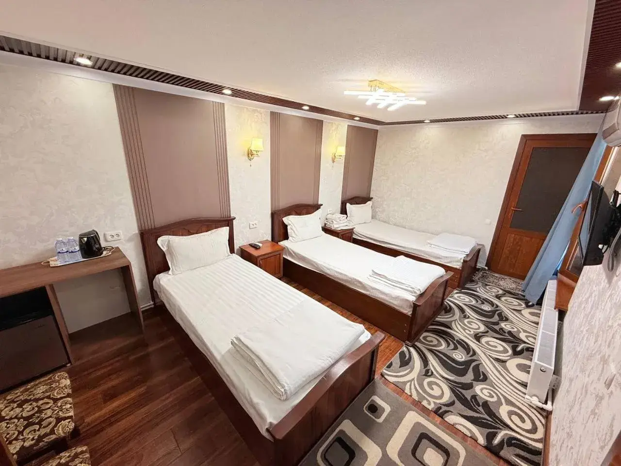 Triple Room in Sherxan House Triple Room in Sherxan House