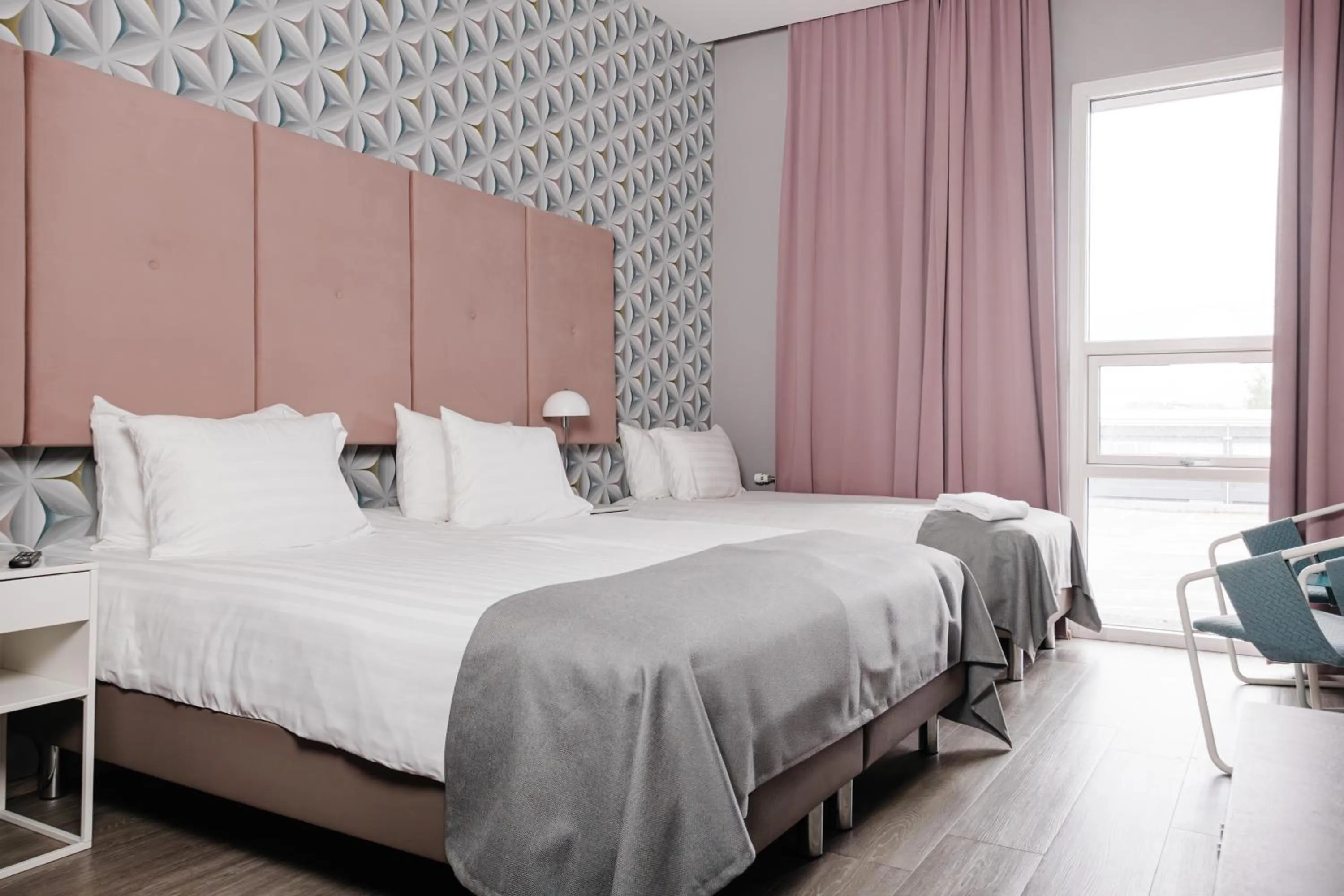 Bed in ODDSSON Midtown Hotel