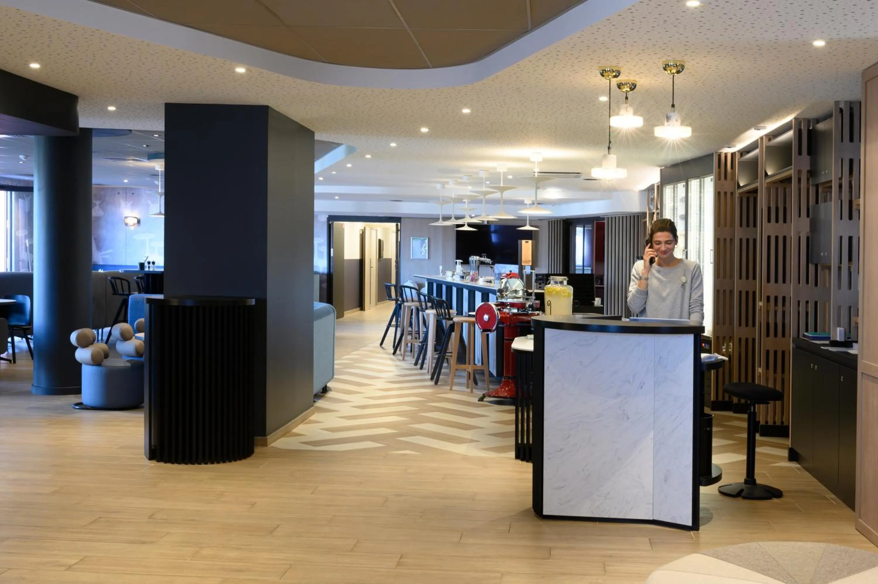 Lobby or reception in Novotel Saint-Étienne Centre Gare Châteaucreux
