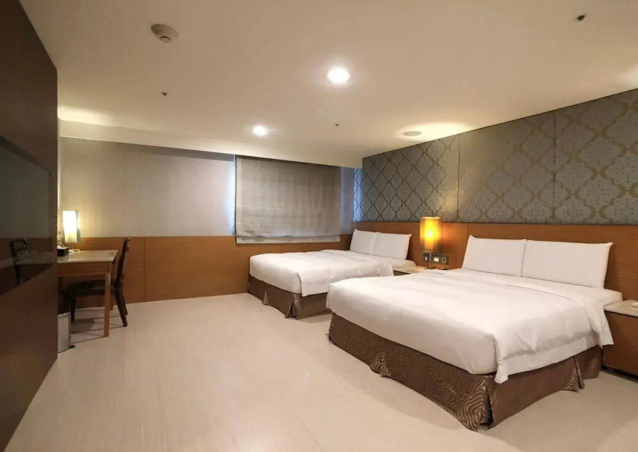 Bed in Shihzuwan Hotel – Kaohsiung Station Bed in Shihzuwan Hotel – Kaohsiung Station