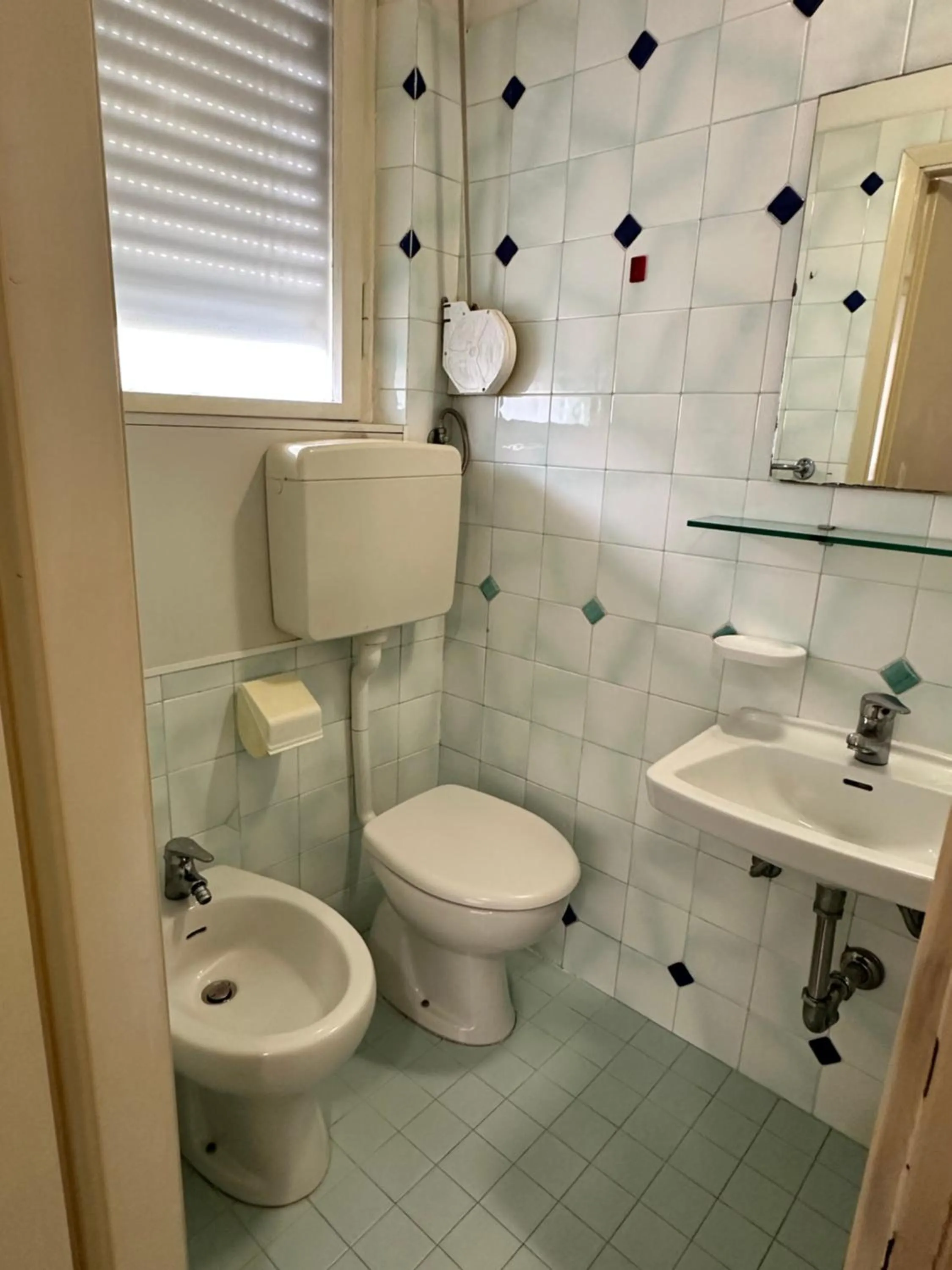 Toilet in Hotel Enna Rimini