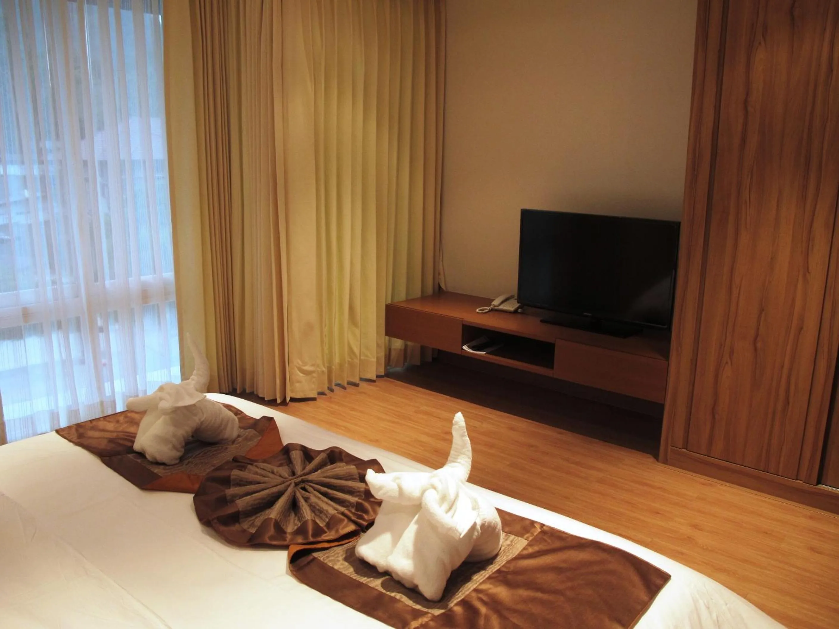 Bed in The Privilege Residence