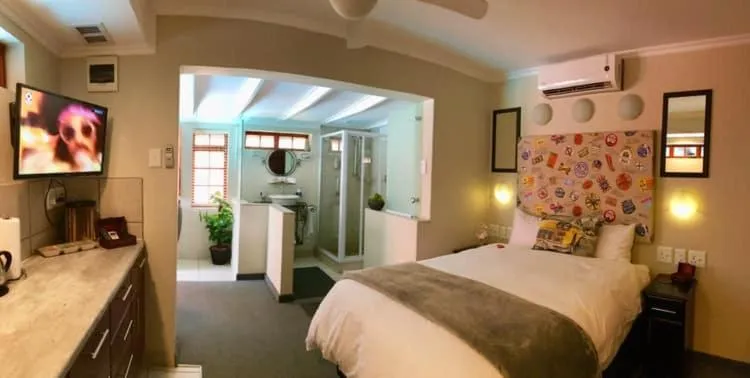 Photo of the whole room, Bed in The Travel Inn Durban