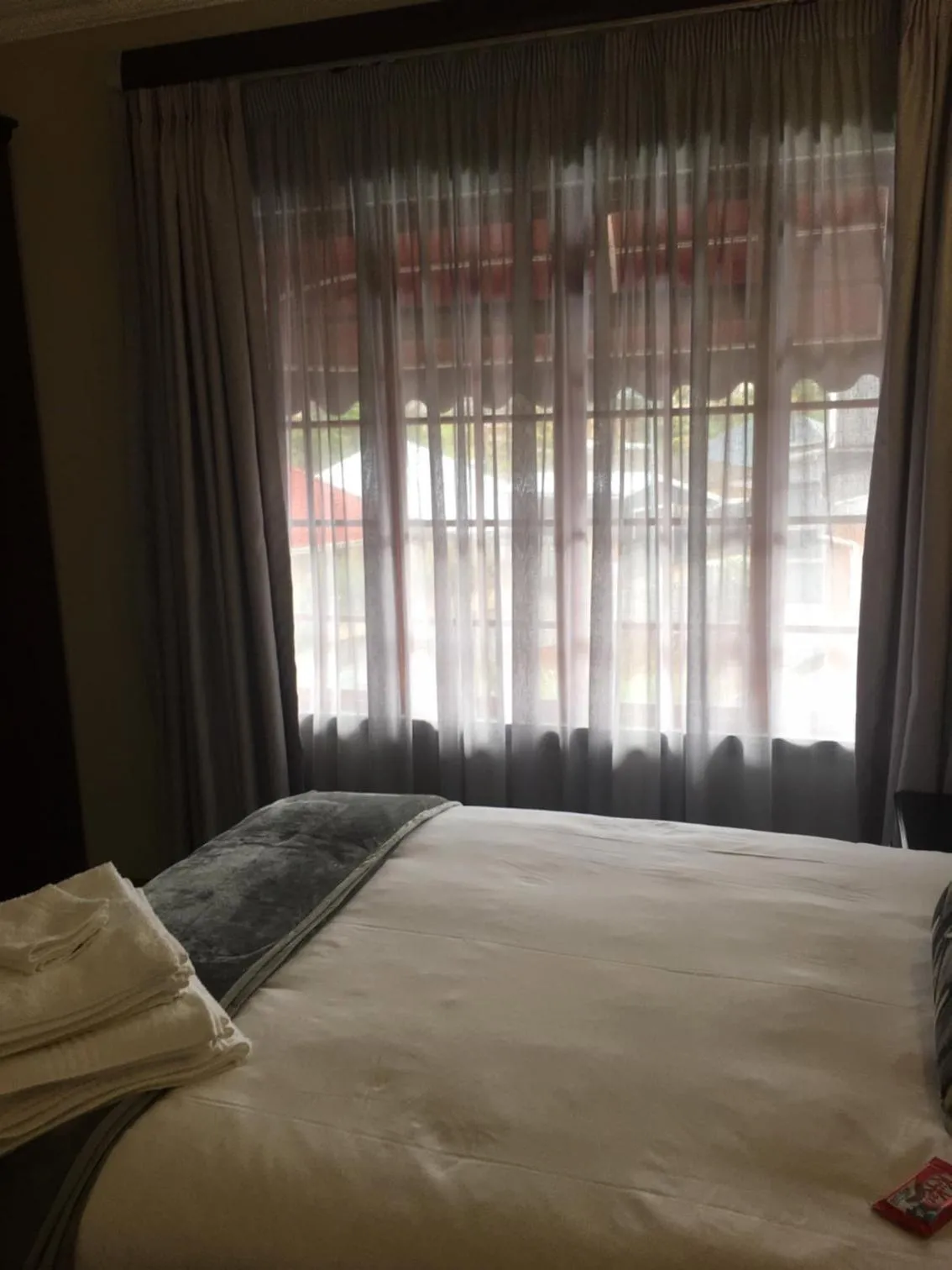 Quiet street view, Bed in The Travel Inn Durban