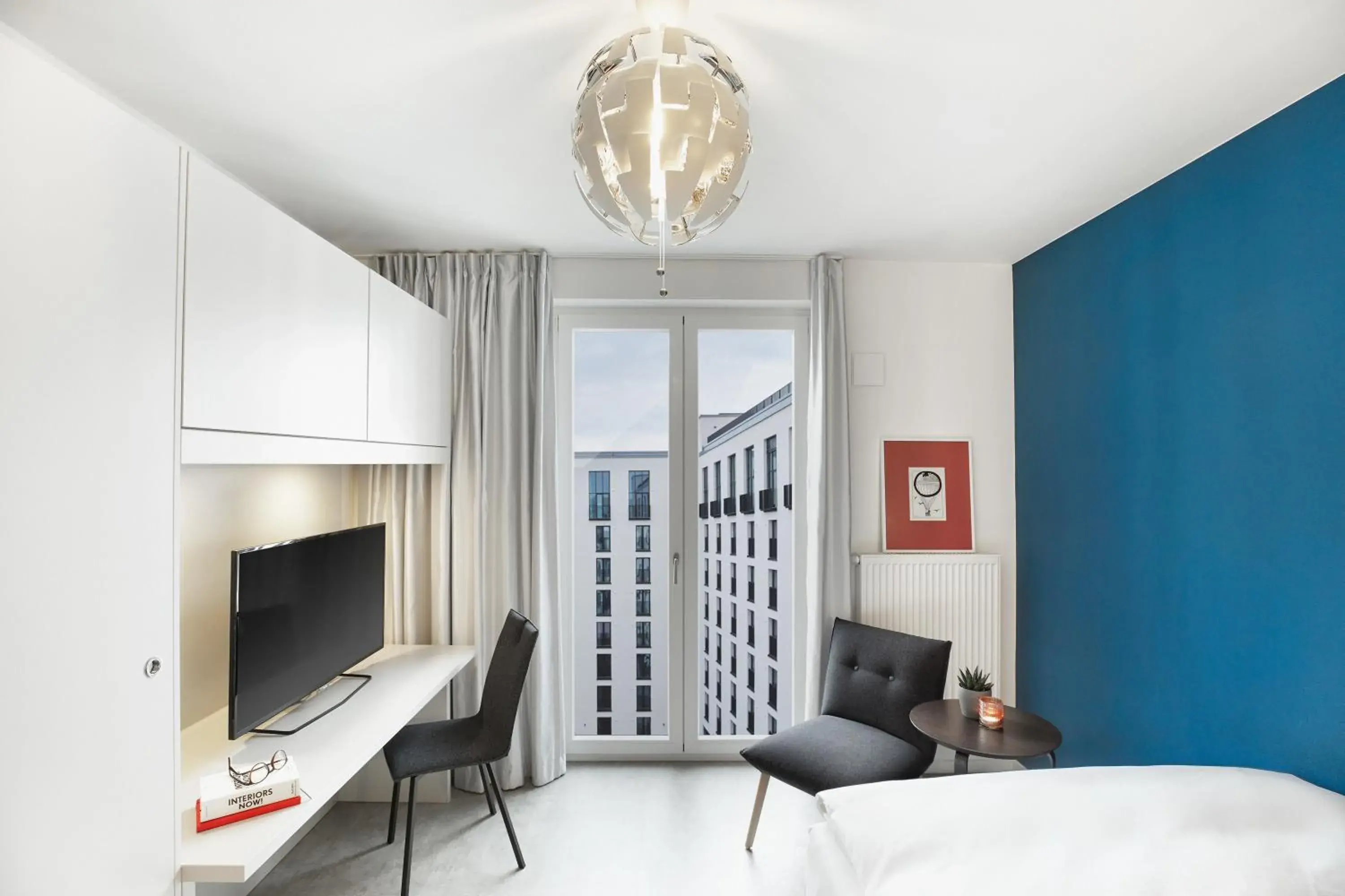 TV and multimedia, Bed in H.ome Serviced Apartments München TV and multimedia, Bed in H.ome Serviced Apartments München