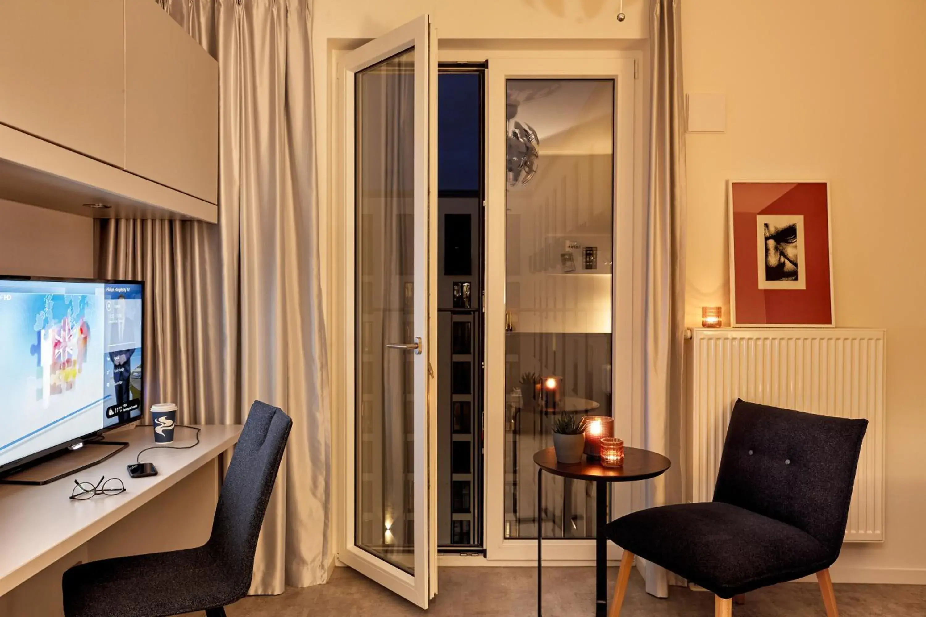 TV and multimedia in H.ome Serviced Apartments München TV and multimedia in H.ome Serviced Apartments München