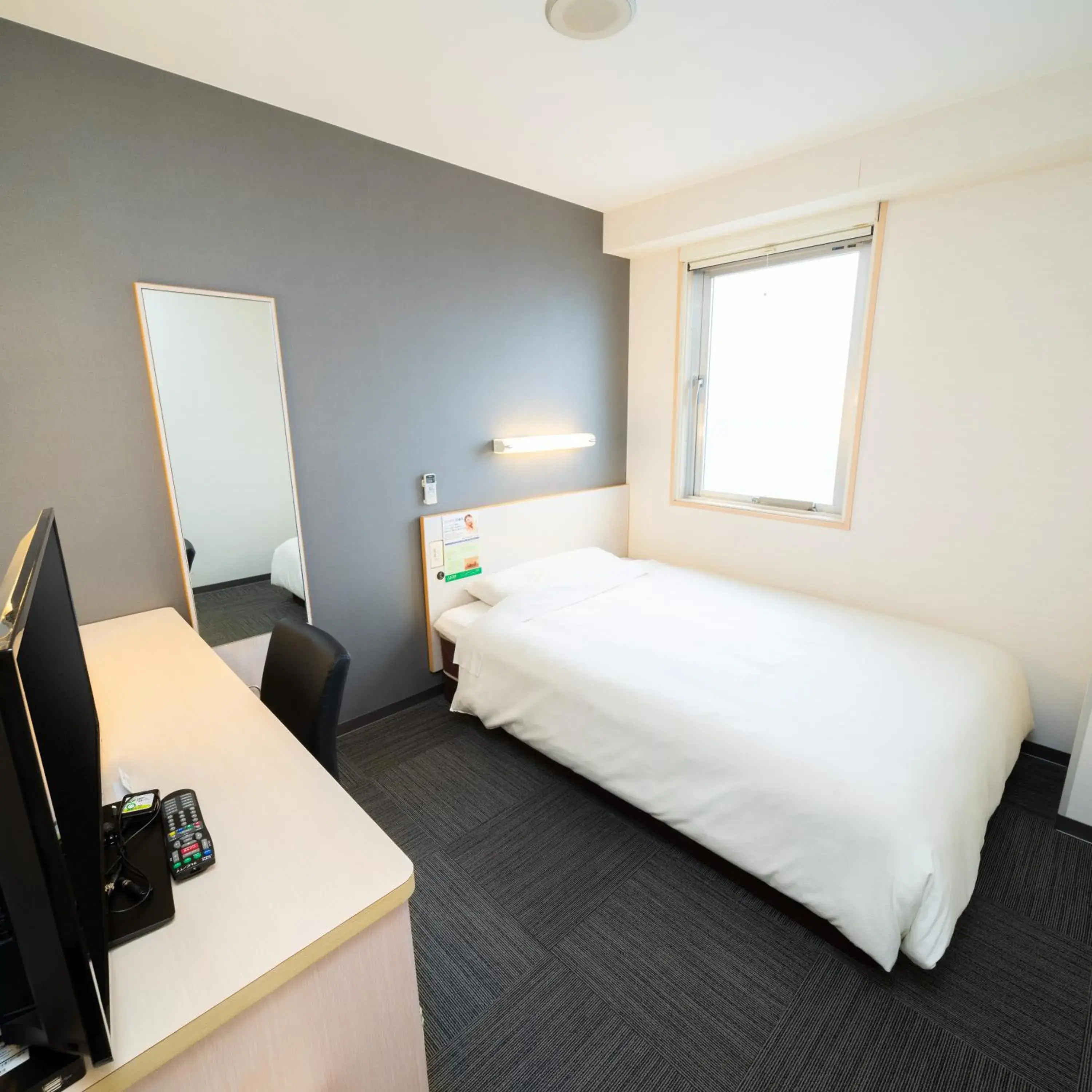 Bed in Super Hotel Tokyo Kameido Bed in Super Hotel Tokyo Kameido