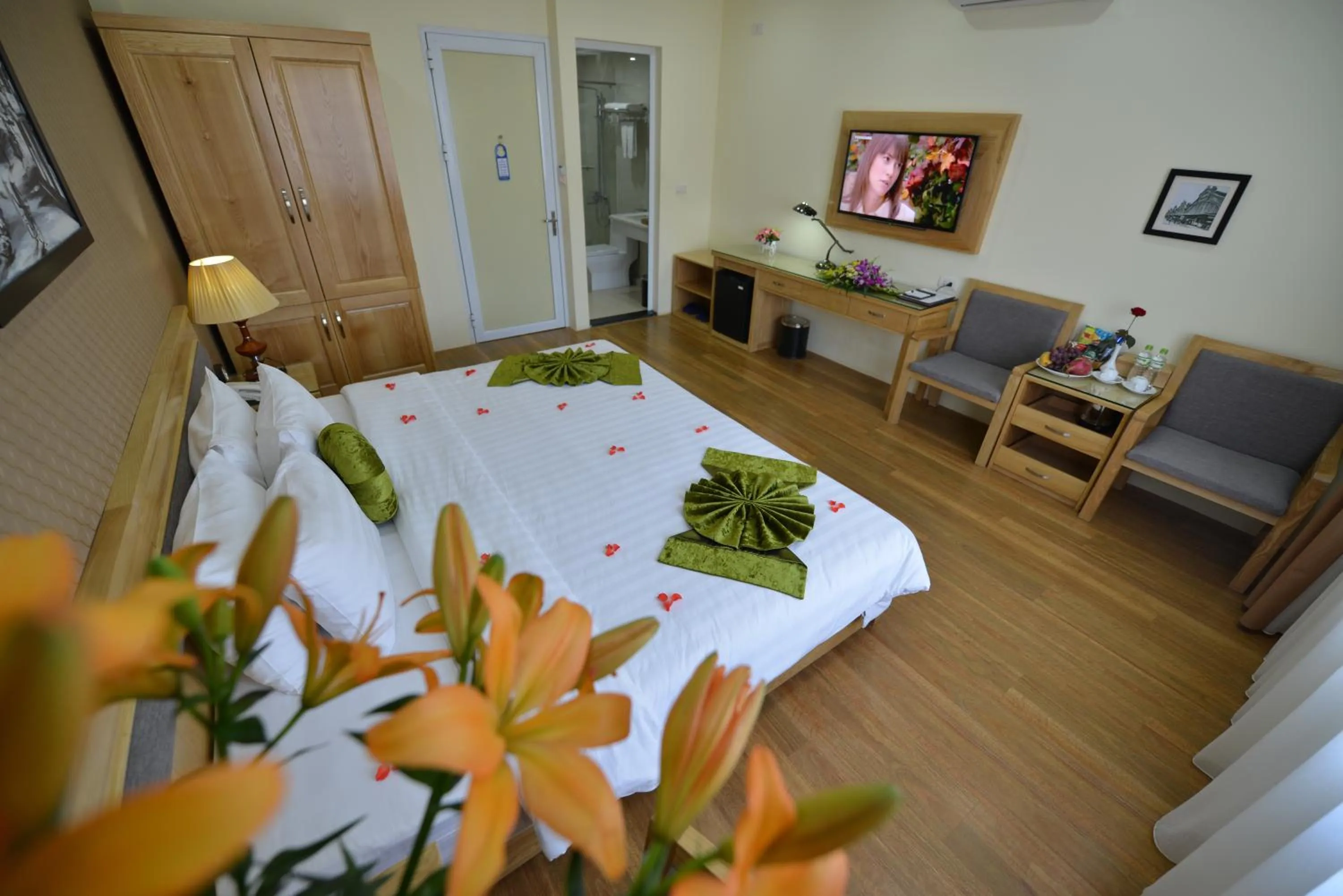 Photo of the whole room, Bed in Blue Hanoi Inn Hotel