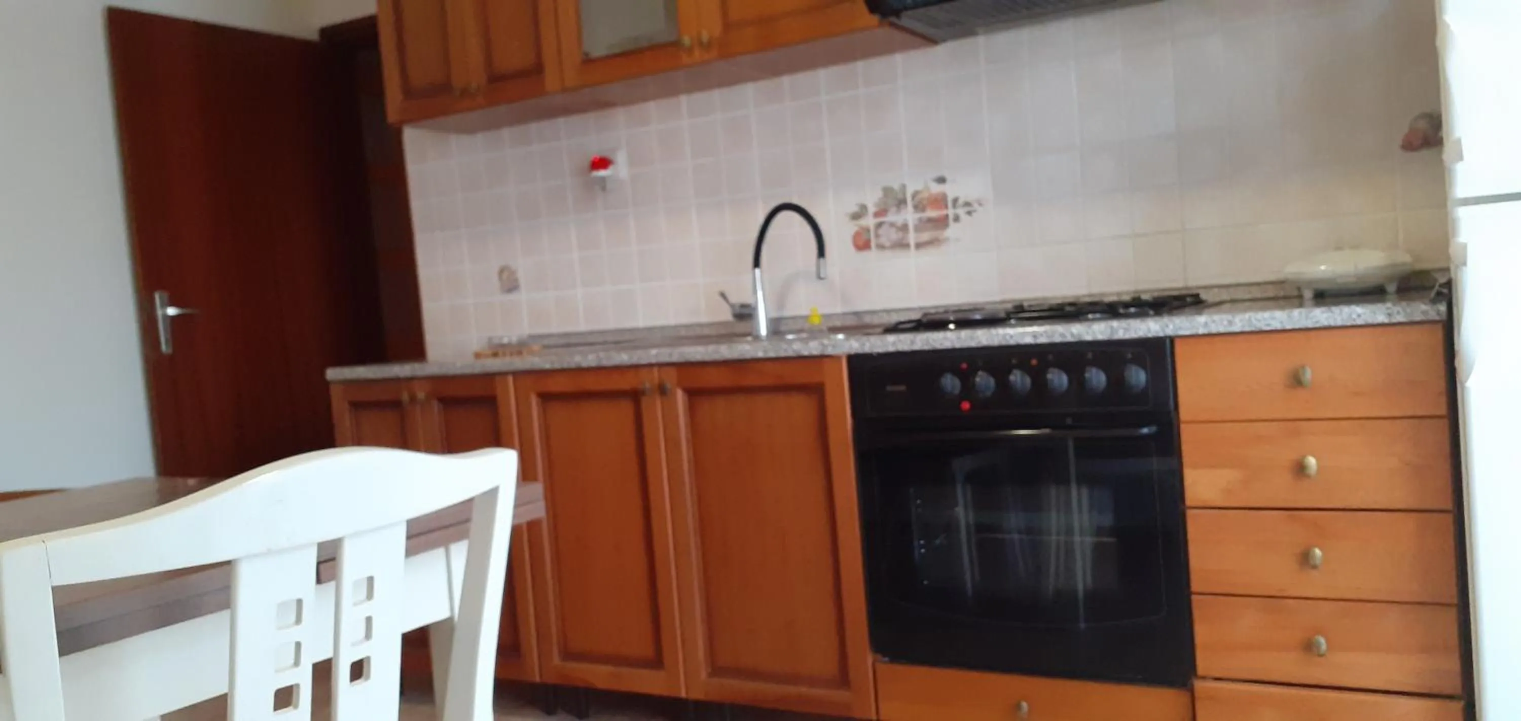 Kitchen or kitchenette in Apartments Mima
