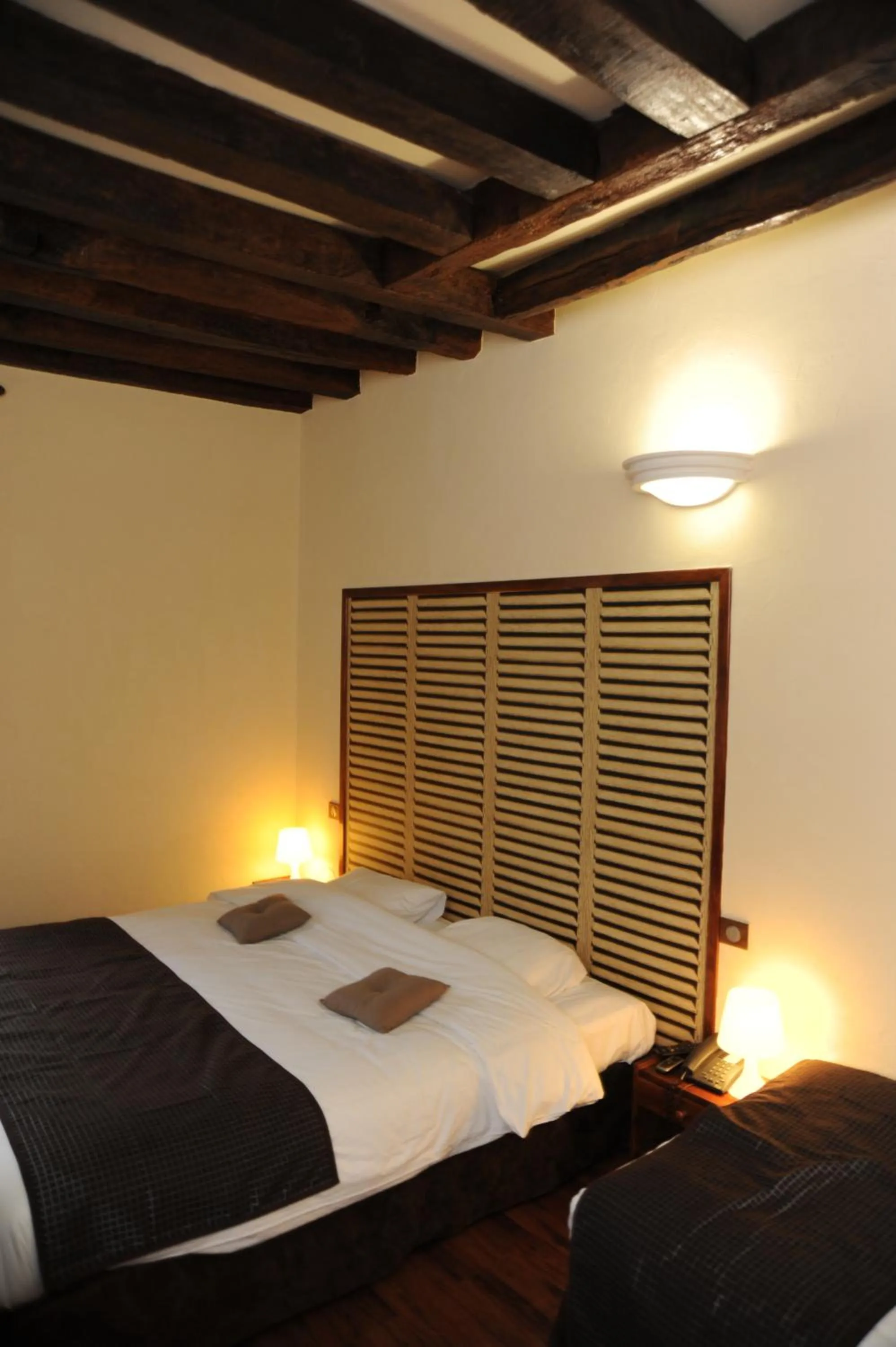 Photo of the whole room, Bed in Logis - Hôtel Restaurant l'Ecu de France