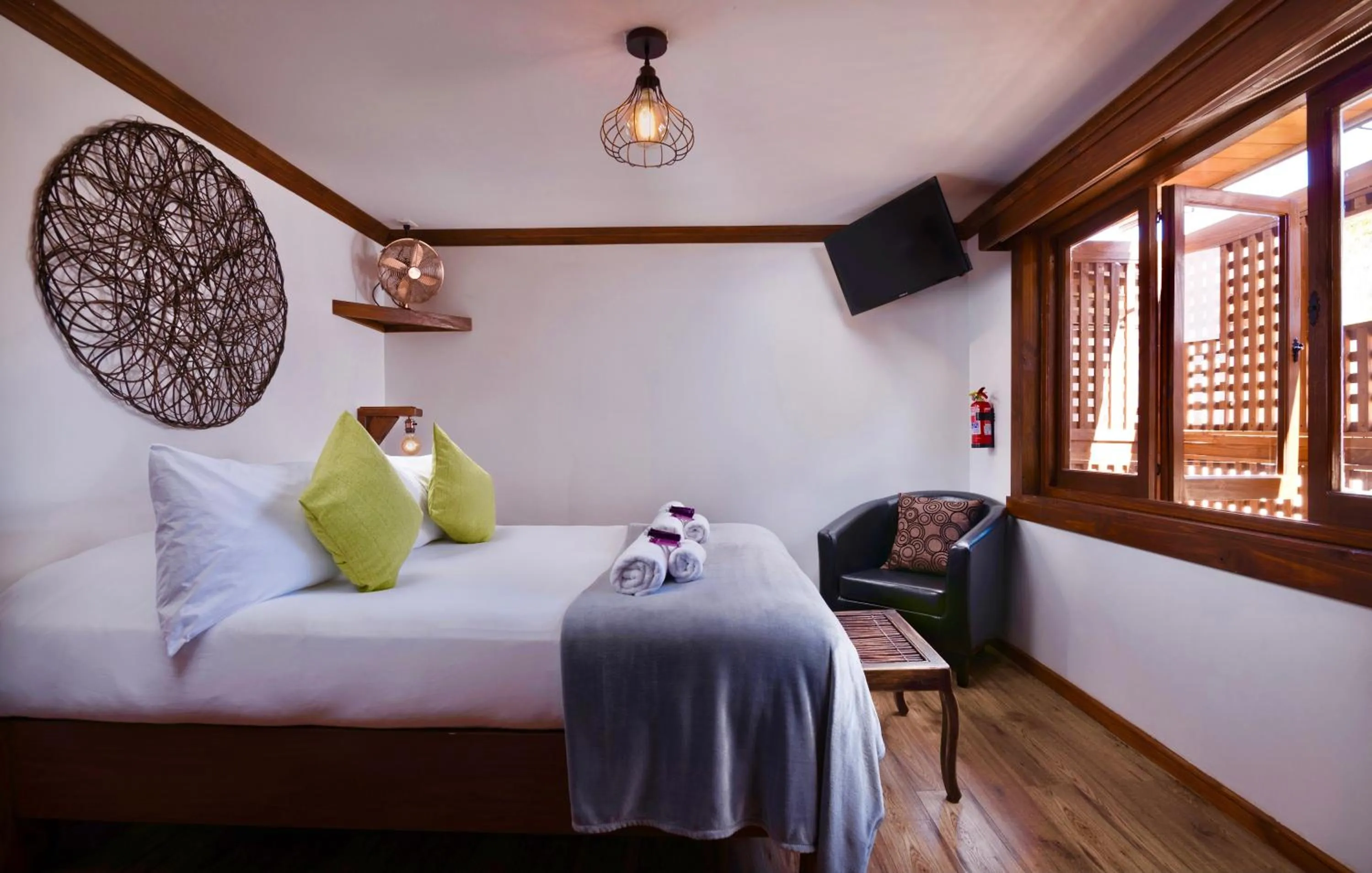 Bed in Esencia Hotel Boutique