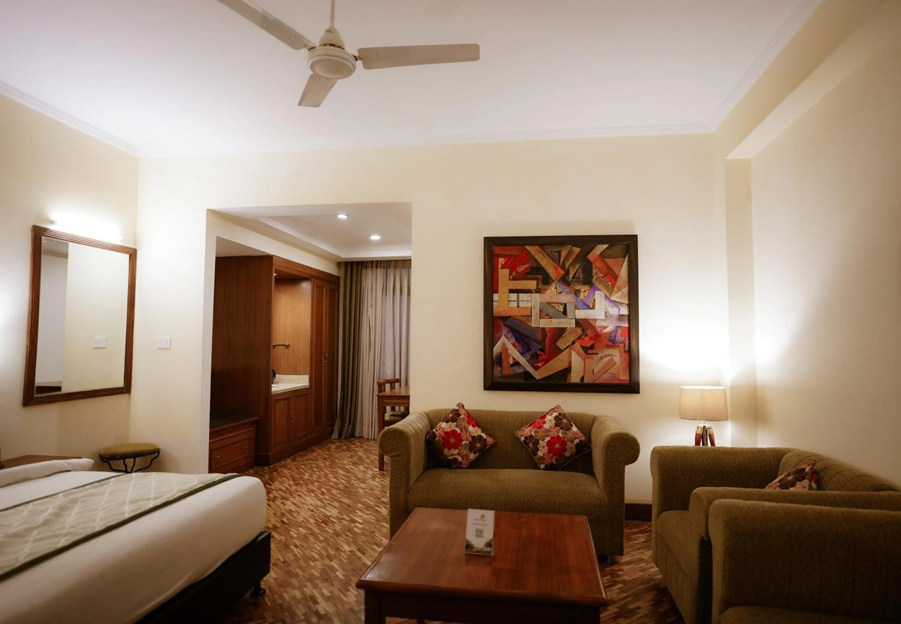 Seating area, Bed in Tulip Inn Green Castle Mall road