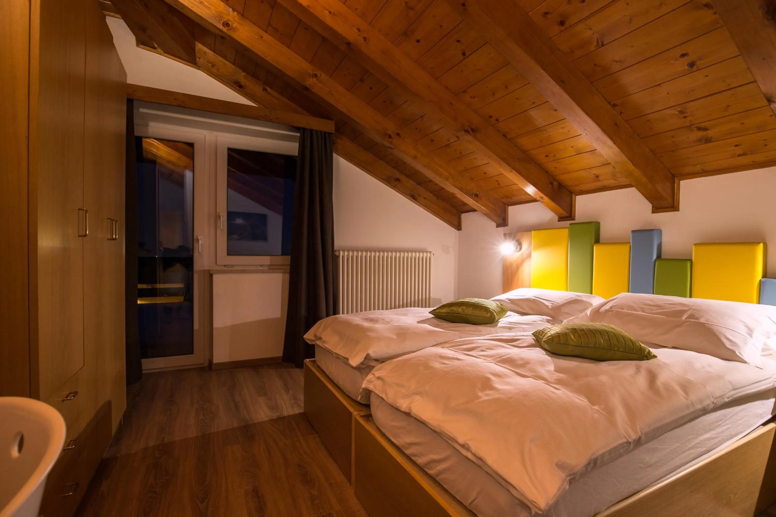Bed in Alpencolor Hotel Tonale