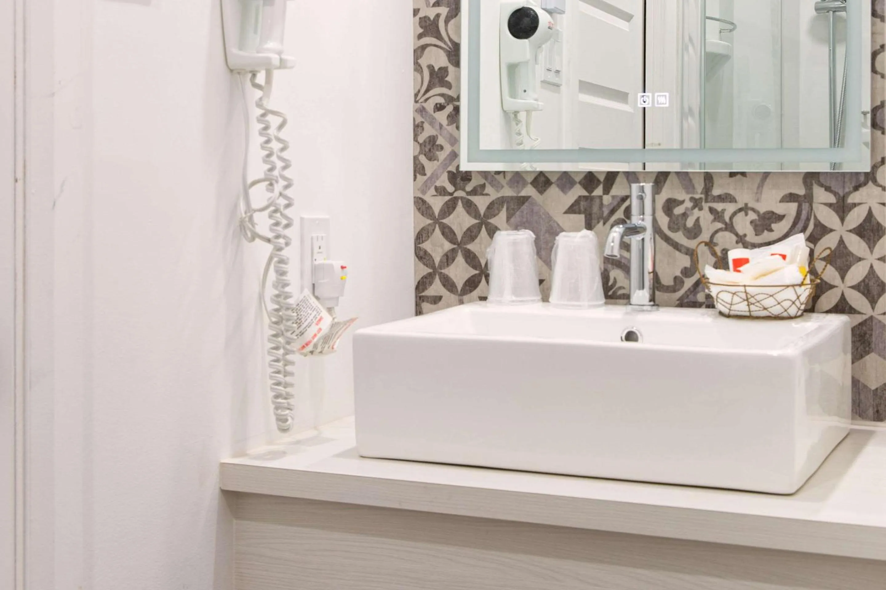 Bathroom in Econo Lodge Inn & Suites