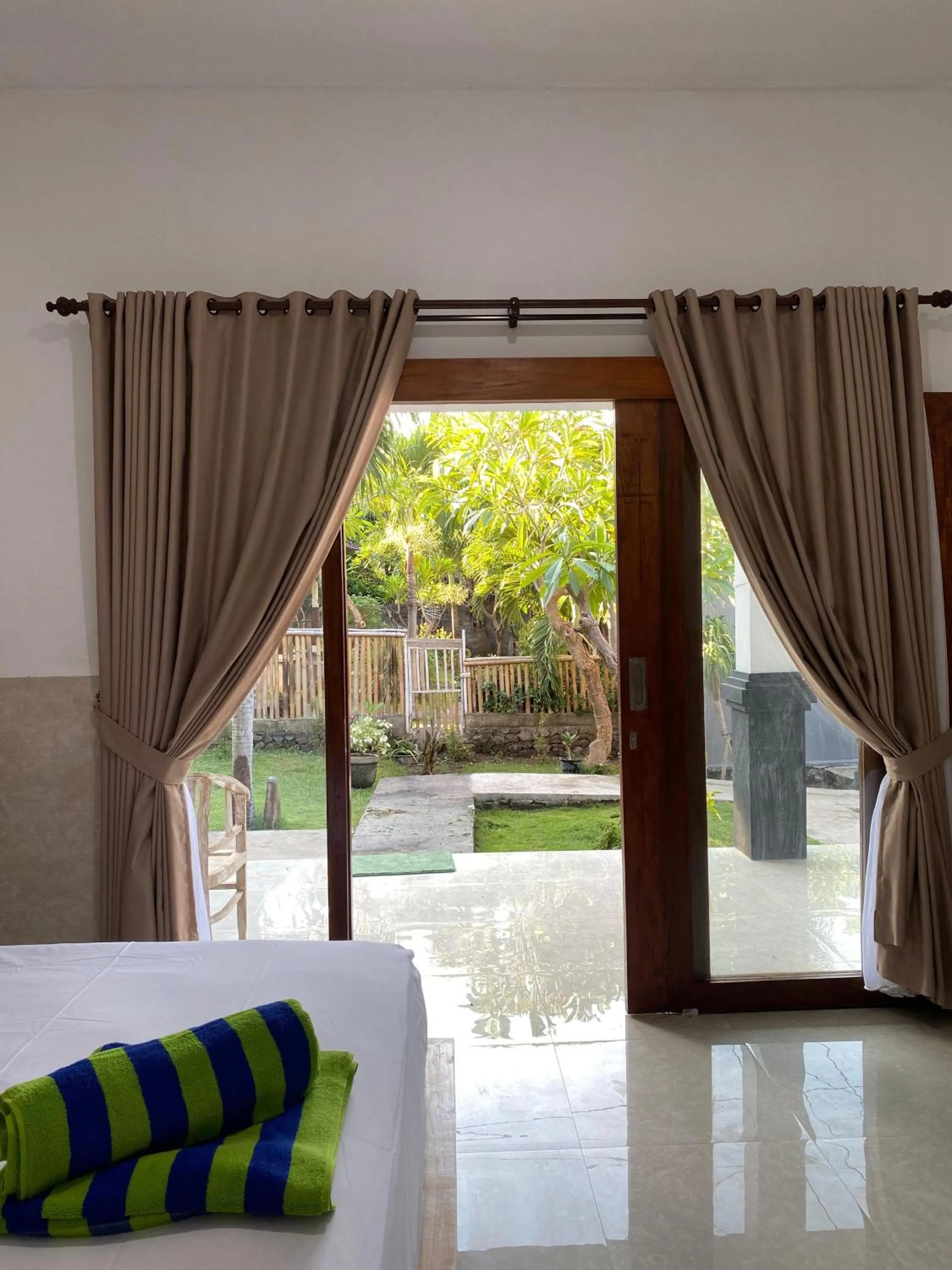 Bed in COCONUT BEACH BUNGALOWs & WARUNG 2