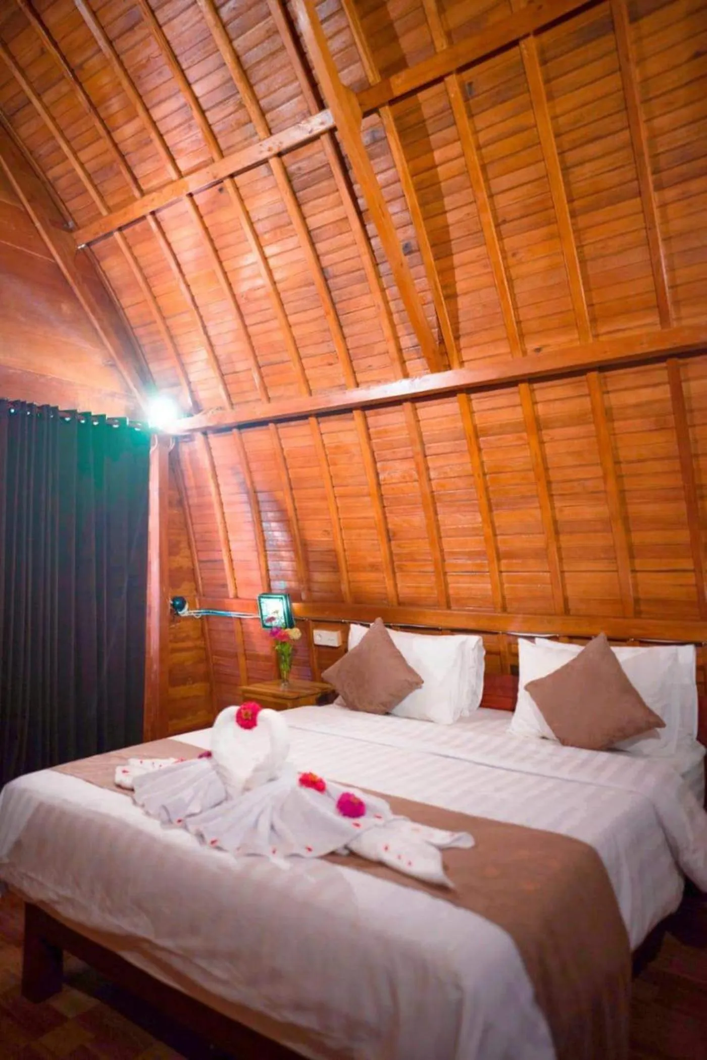 Bed in The Peace Arta Bungalow