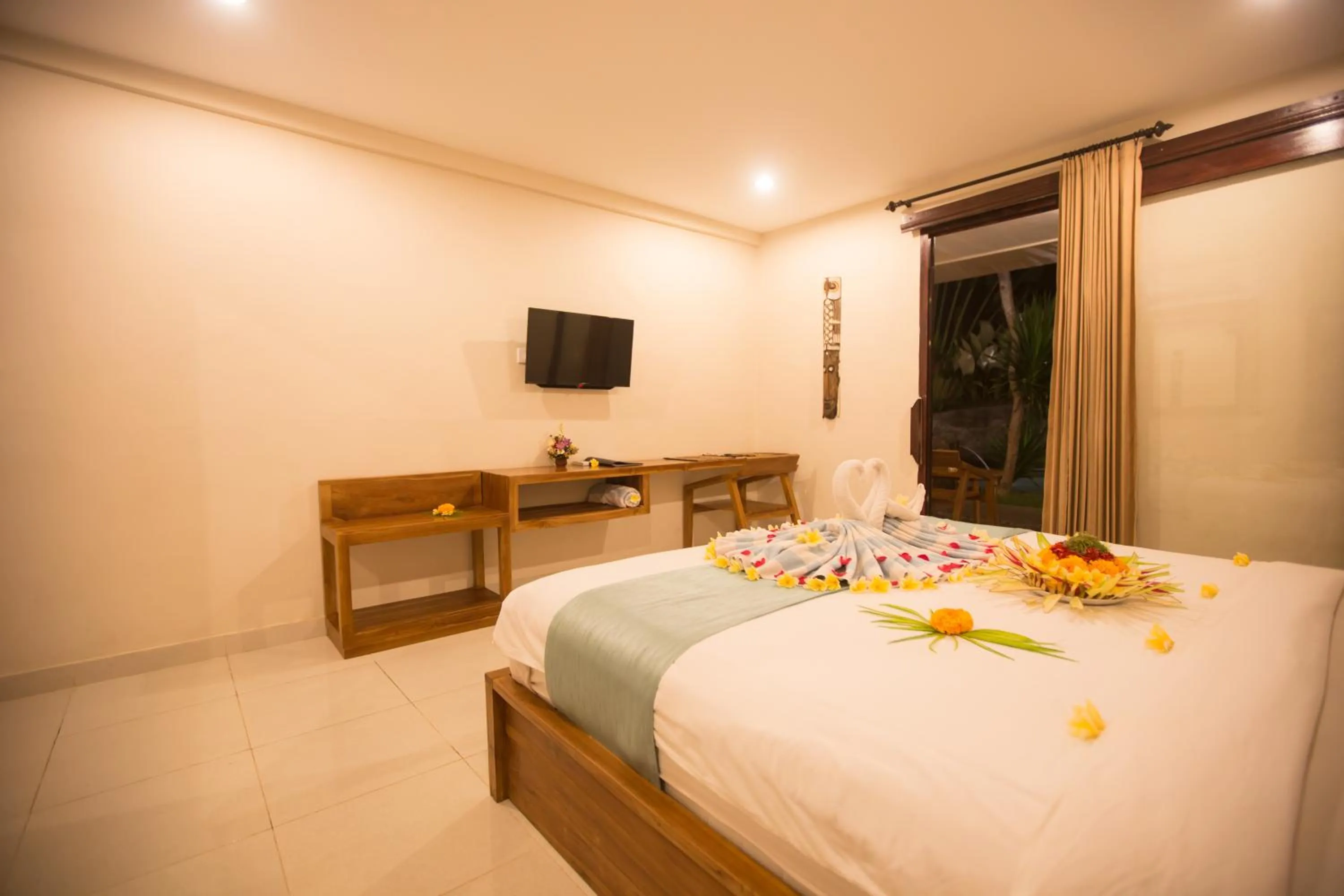 Bed in Asri Sari Ubud Villa & Resort