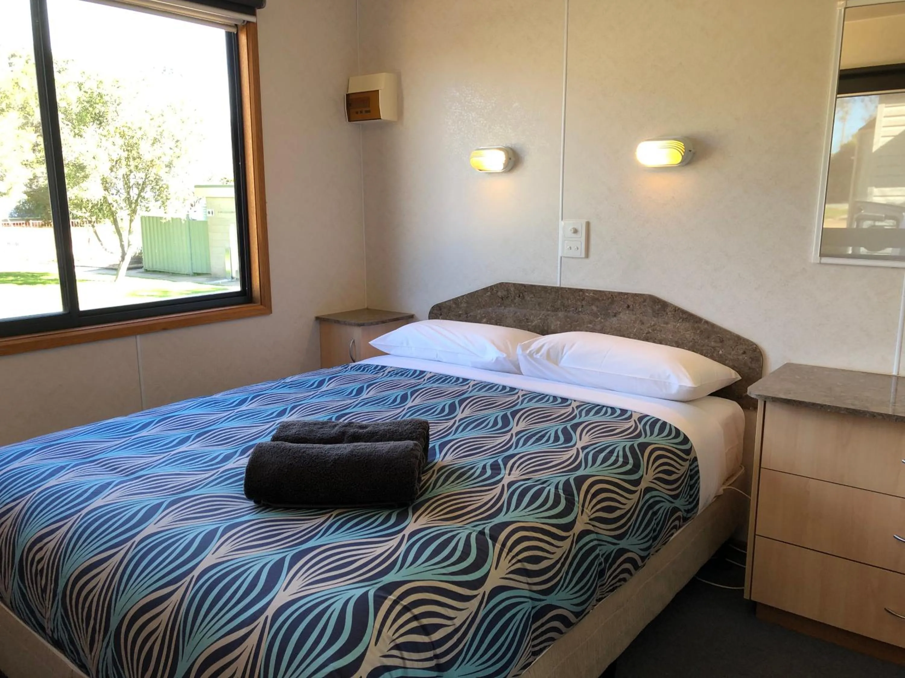 Bedroom, Bed in Acacia Caravan Park & Holiday Units