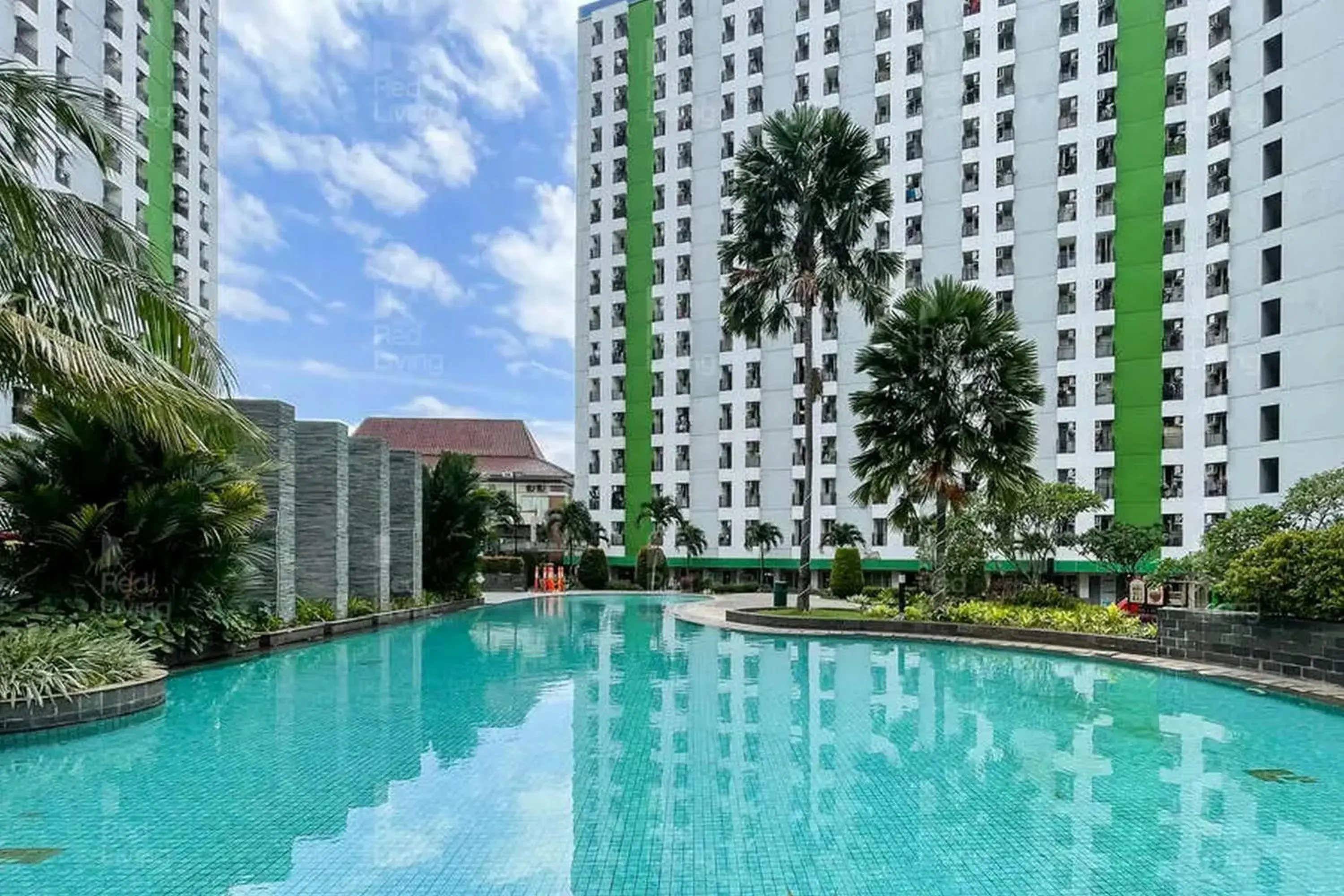 Property building in RedLiving Apartemen Green Lake View Ciputat - Pelangi Rooms 2 Tower E Property building in RedLiving Apartemen Green Lake View Ciputat - Pelangi Rooms 2 Tower E