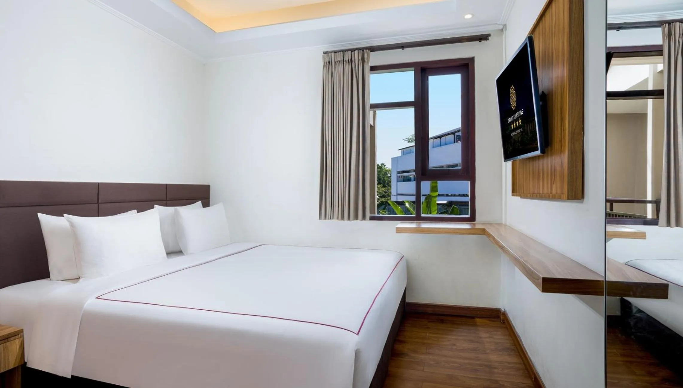 Bed in Grand Sunshine Resort & Convention