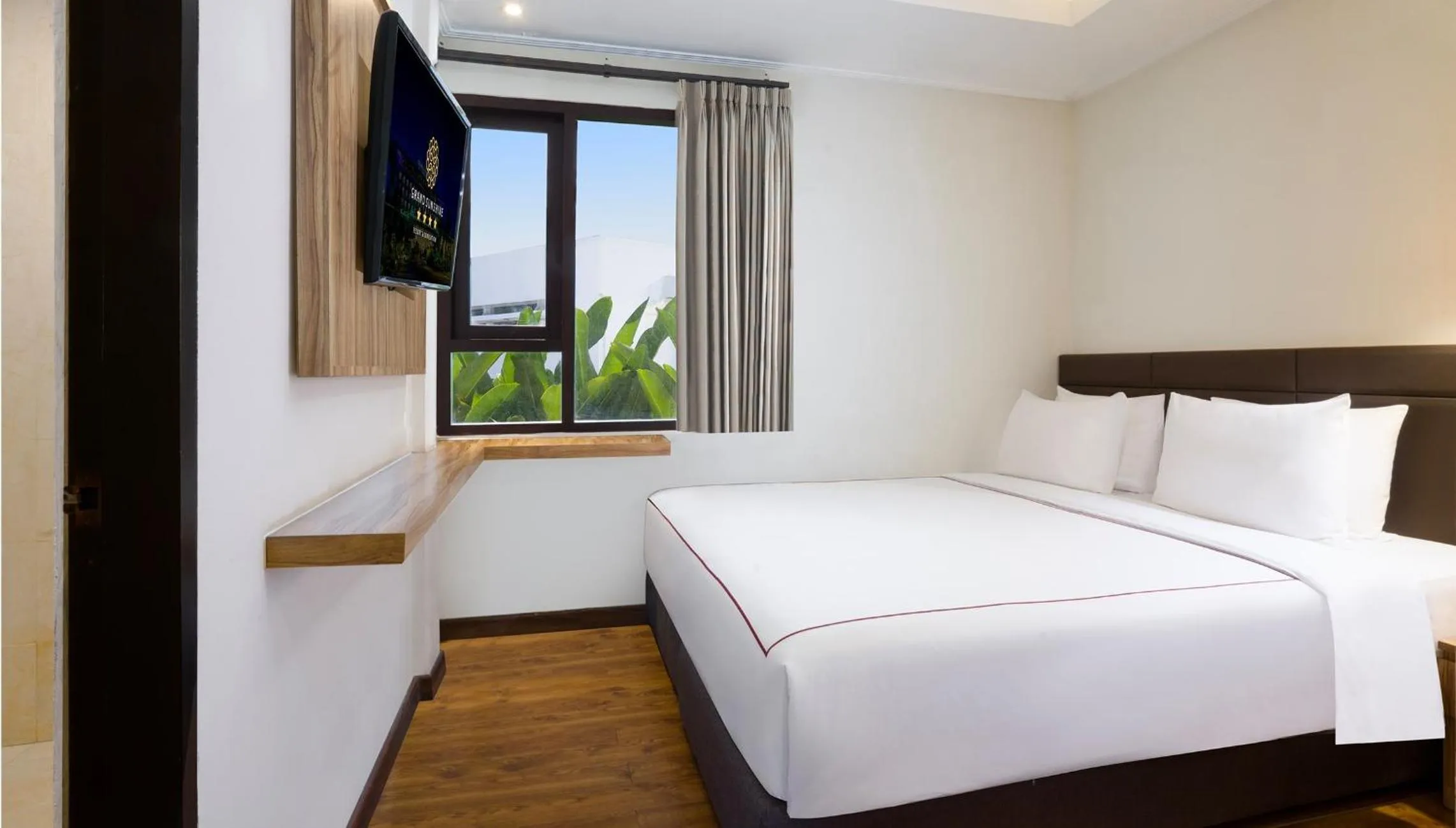 Bed in Grand Sunshine Resort & Convention