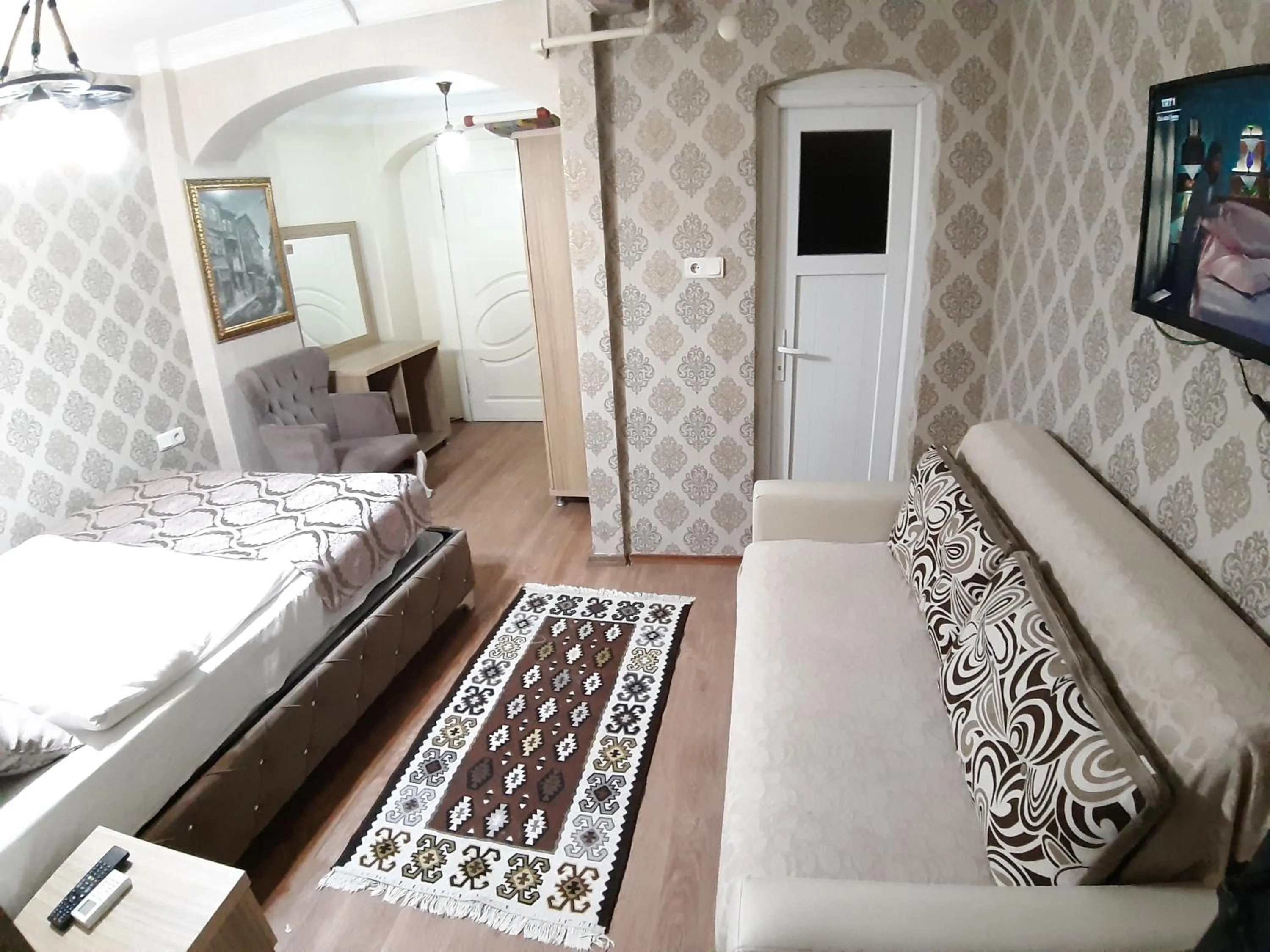 Communal lounge/ TV room in Burak Apart