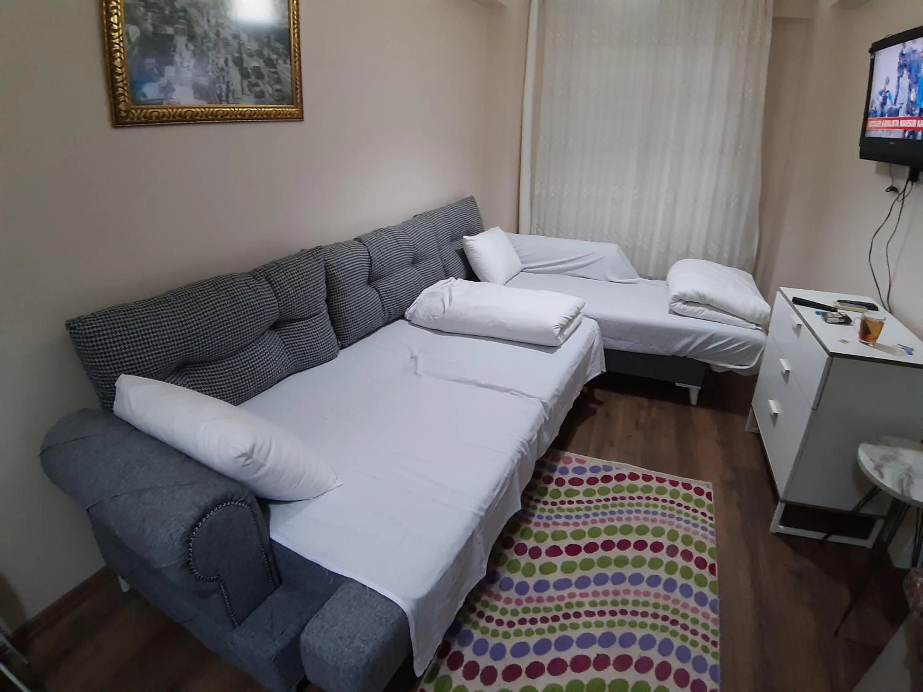 Living room, Bed in Burak Apart