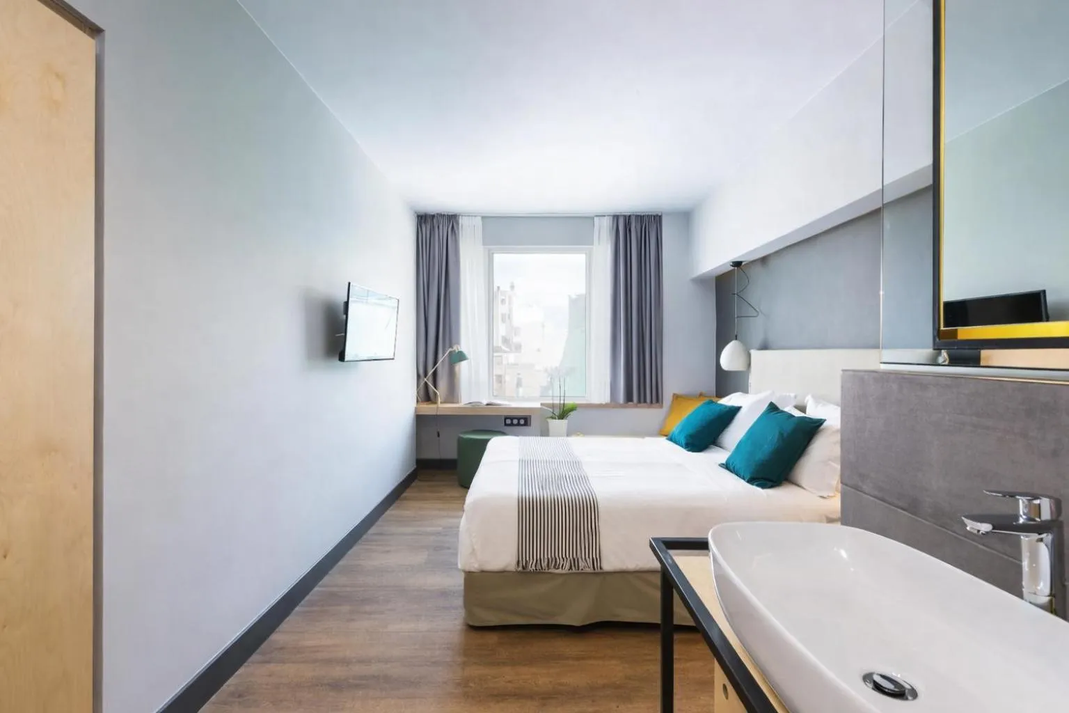 Bed in St. Bjur Suites