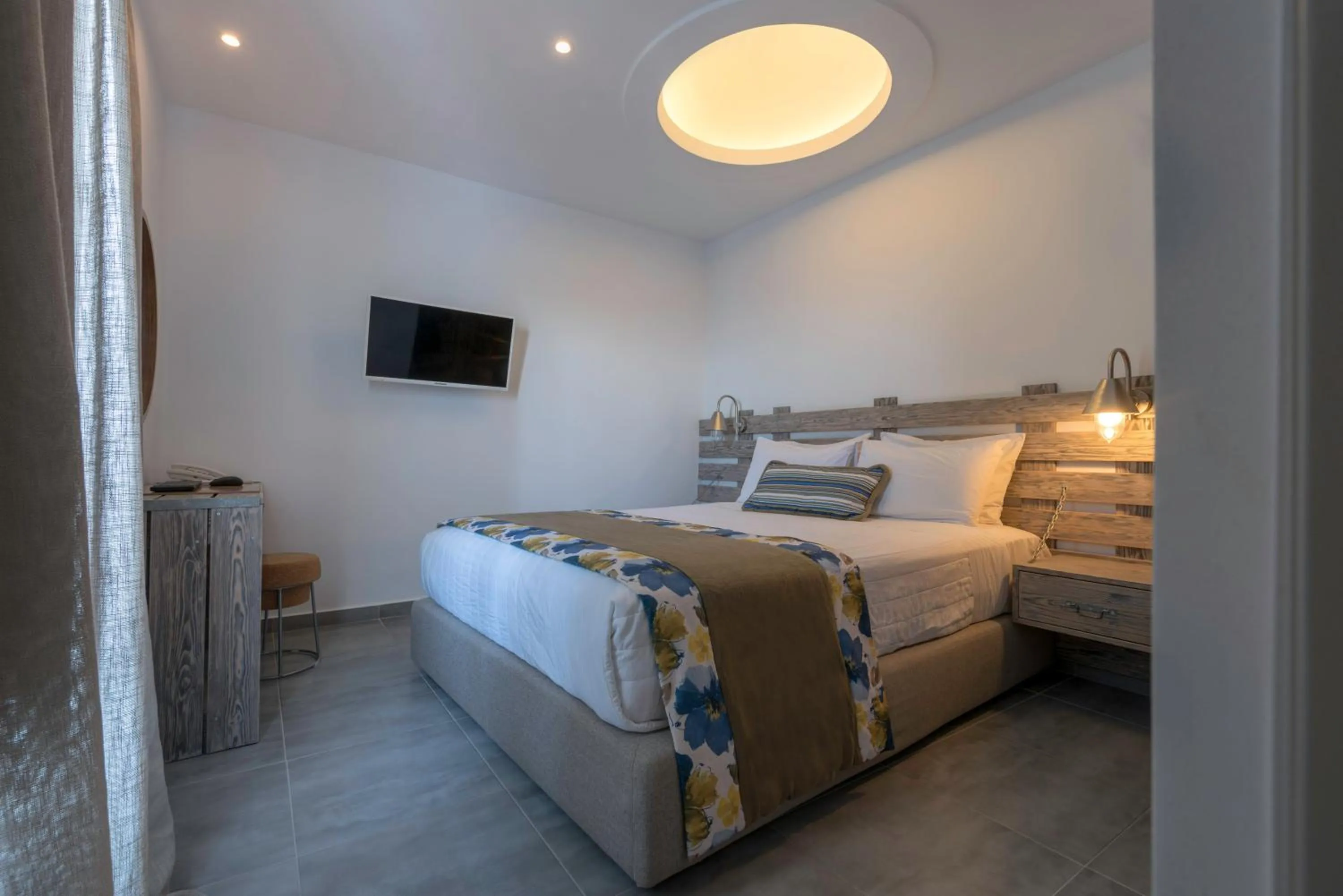 Bed in Caldera's Dolphin Suites