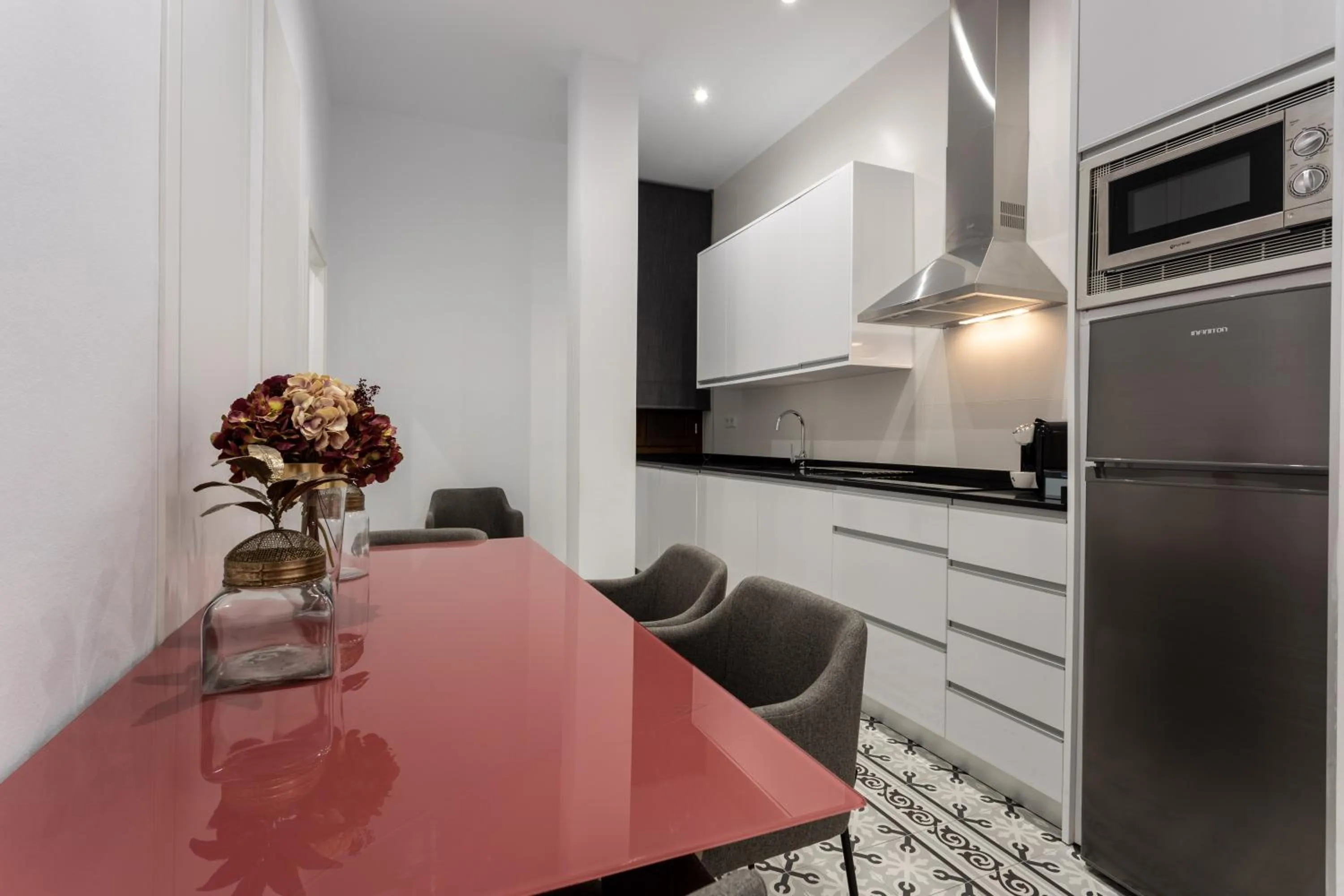 Kitchen or kitchenette in BiBo Suites Plaza Nueva