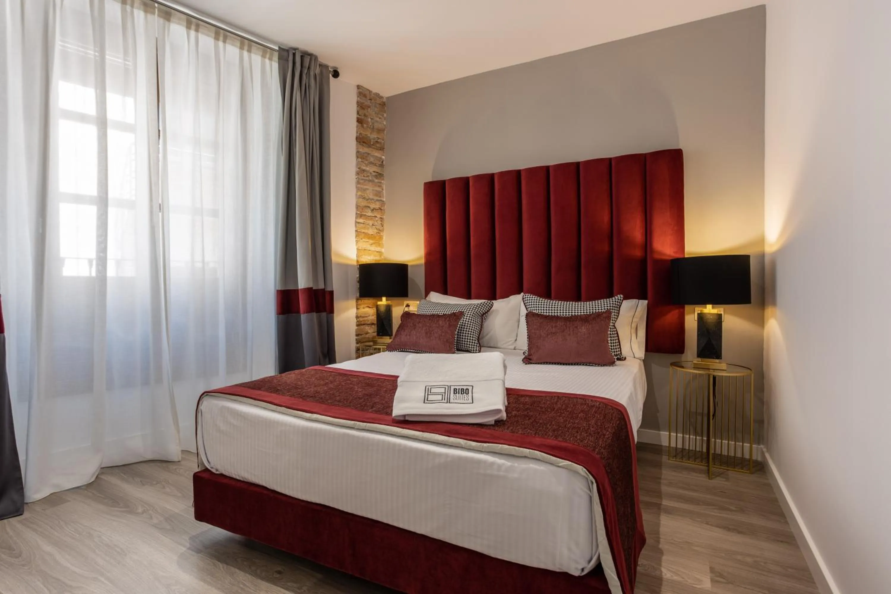 Bed in BiBo Suites Plaza Nueva