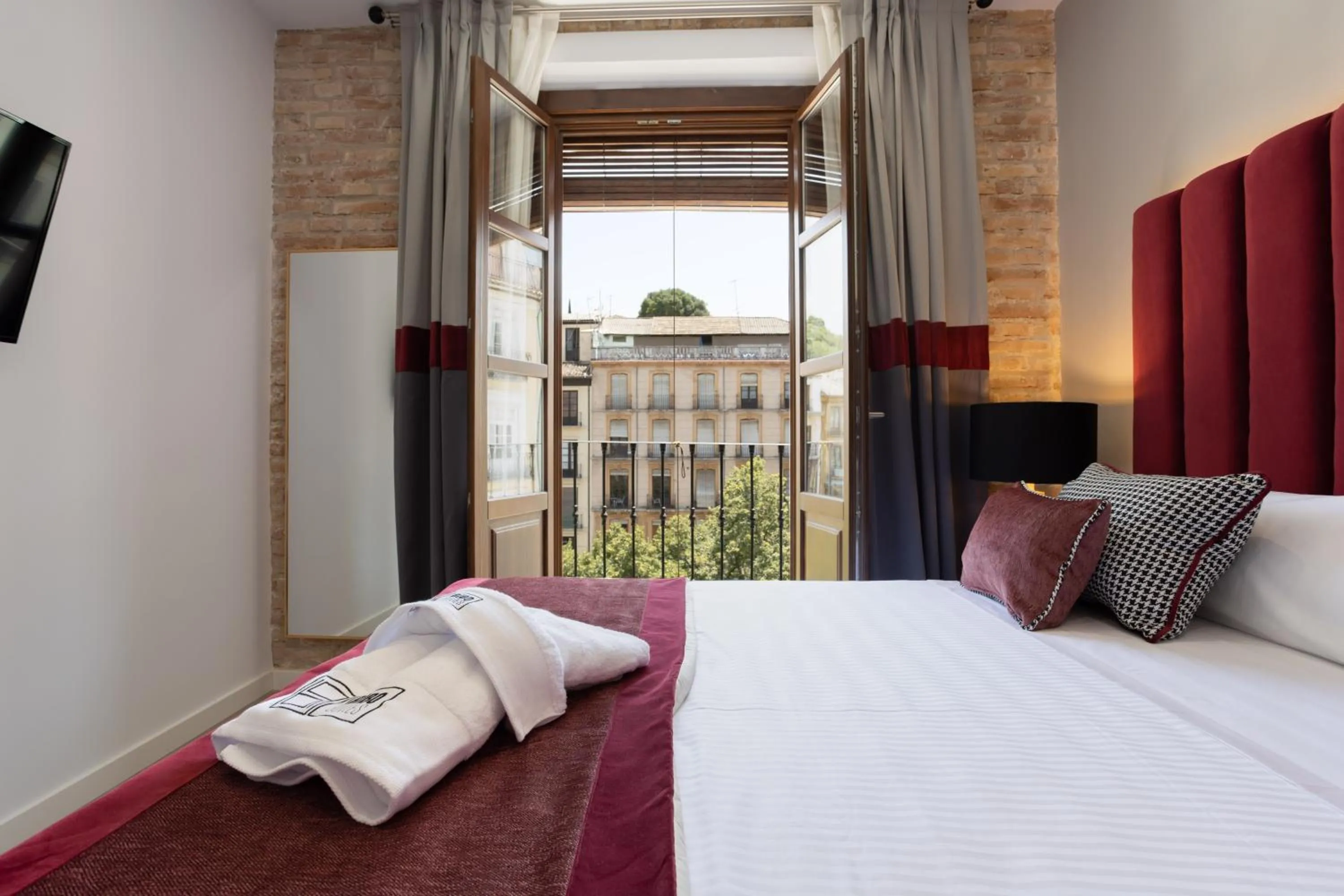 Bedroom, Bed in BiBo Suites Plaza Nueva