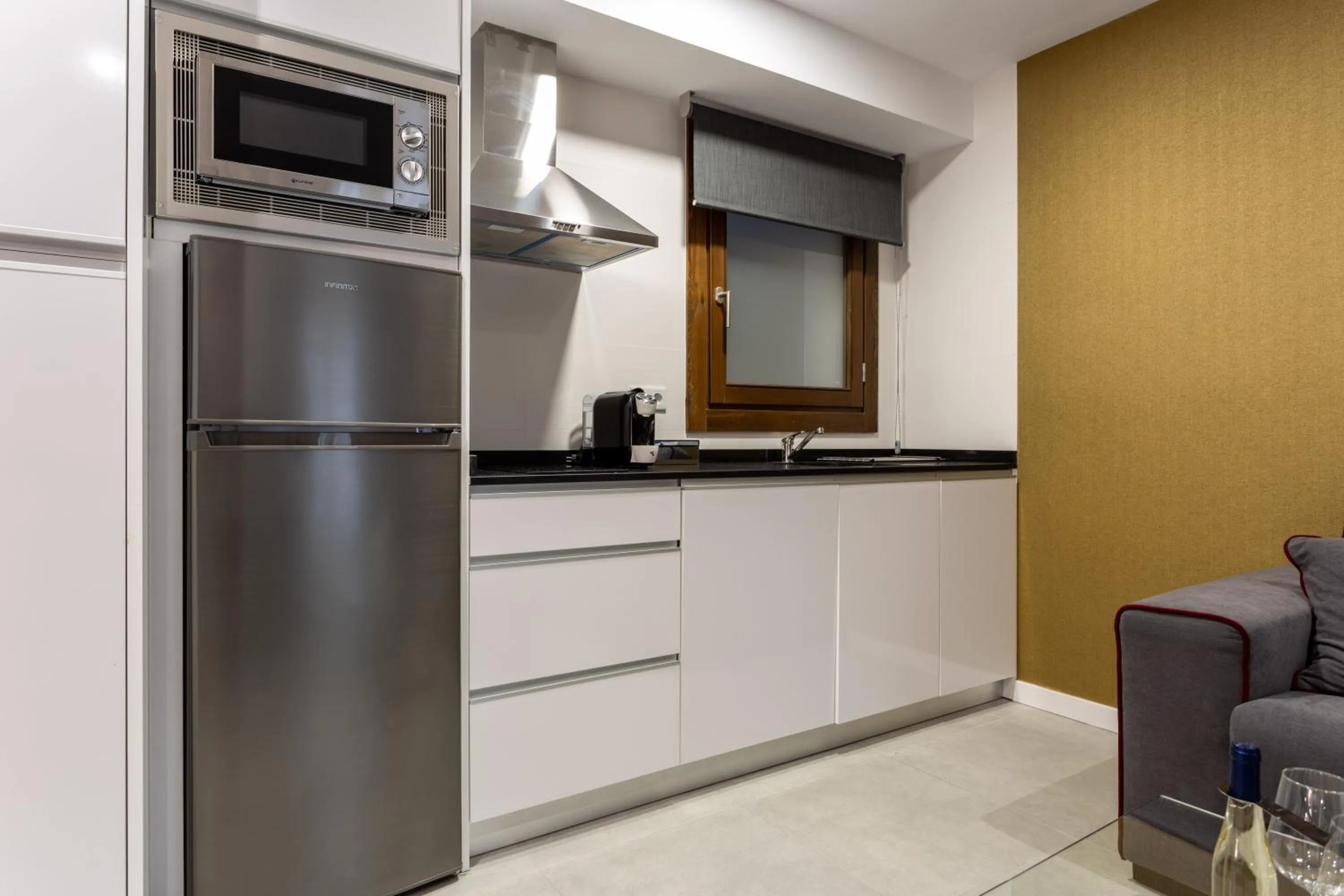 Kitchen or kitchenette in BiBo Suites Plaza Nueva