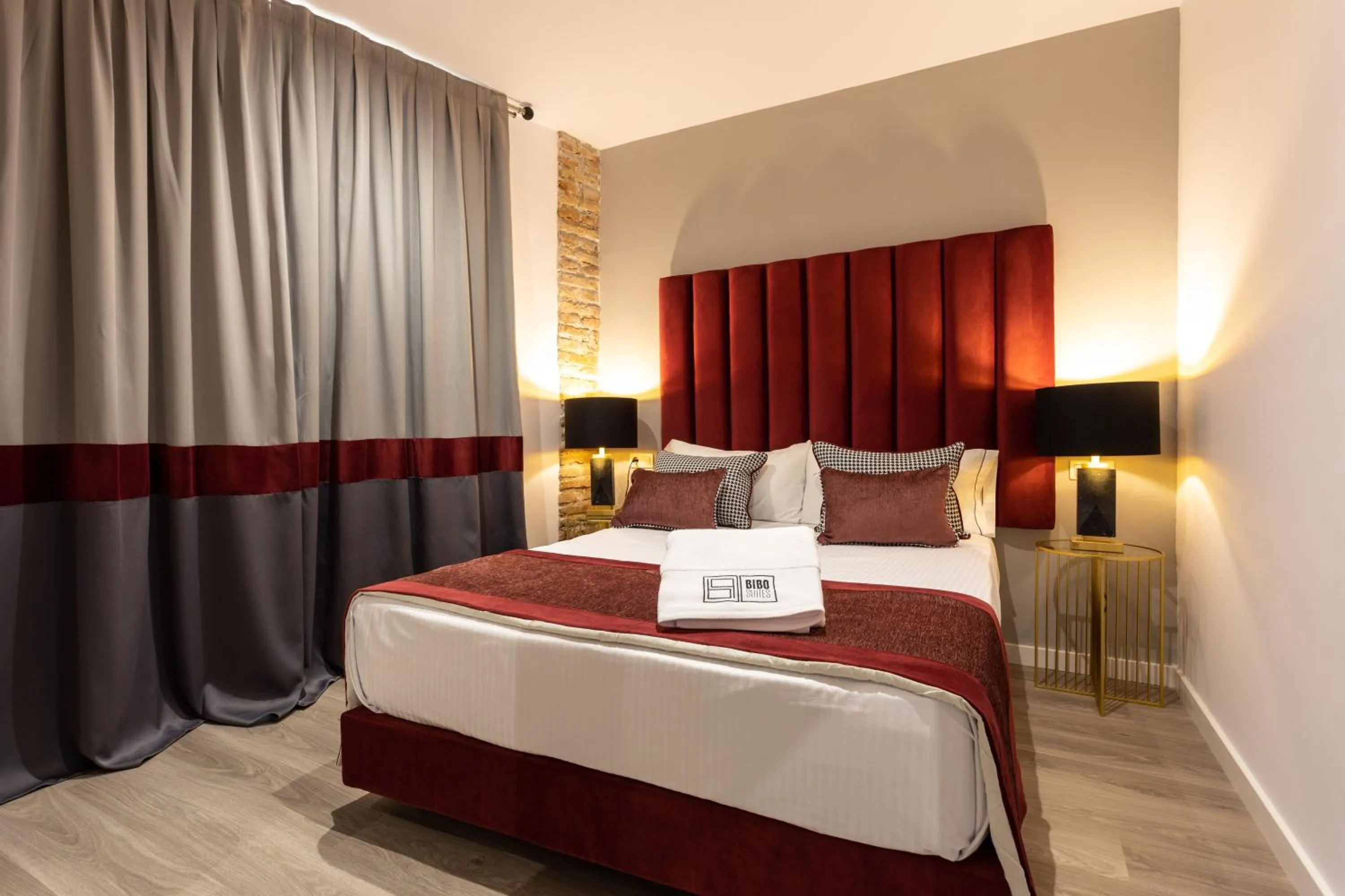 Bed in BiBo Suites Plaza Nueva