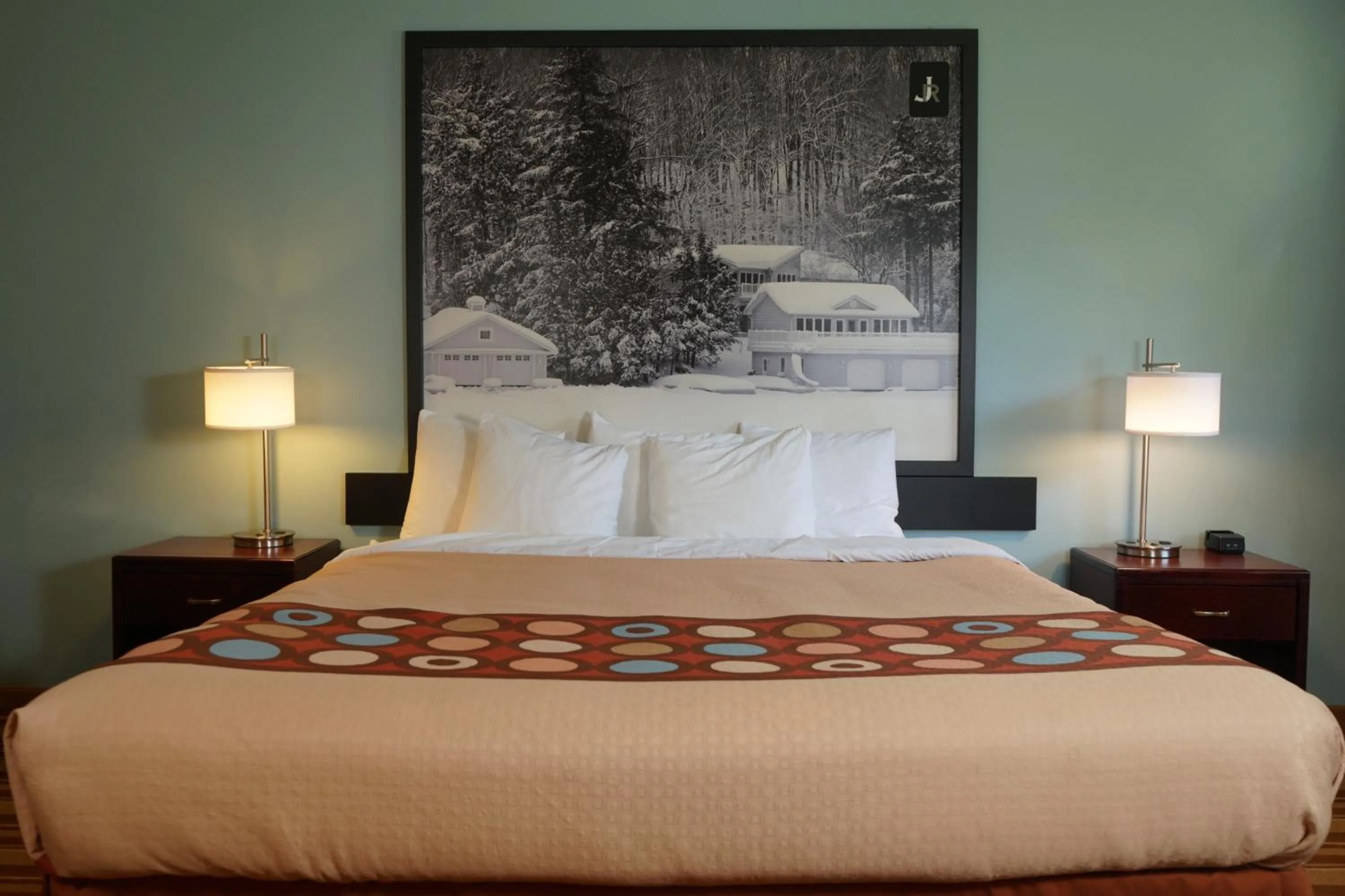 Bed in Jolly Roger Inn & Resort