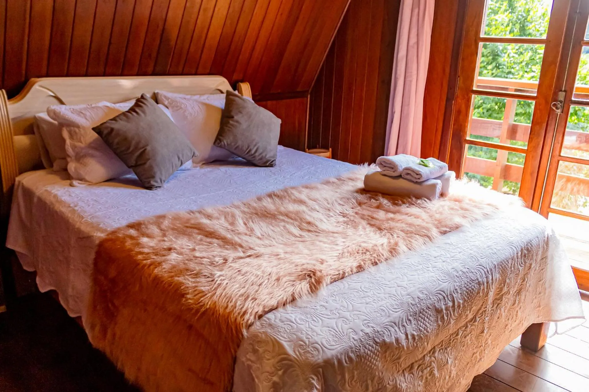 Photo of the whole room, Bed in Pousada Chalé Sol Nascente