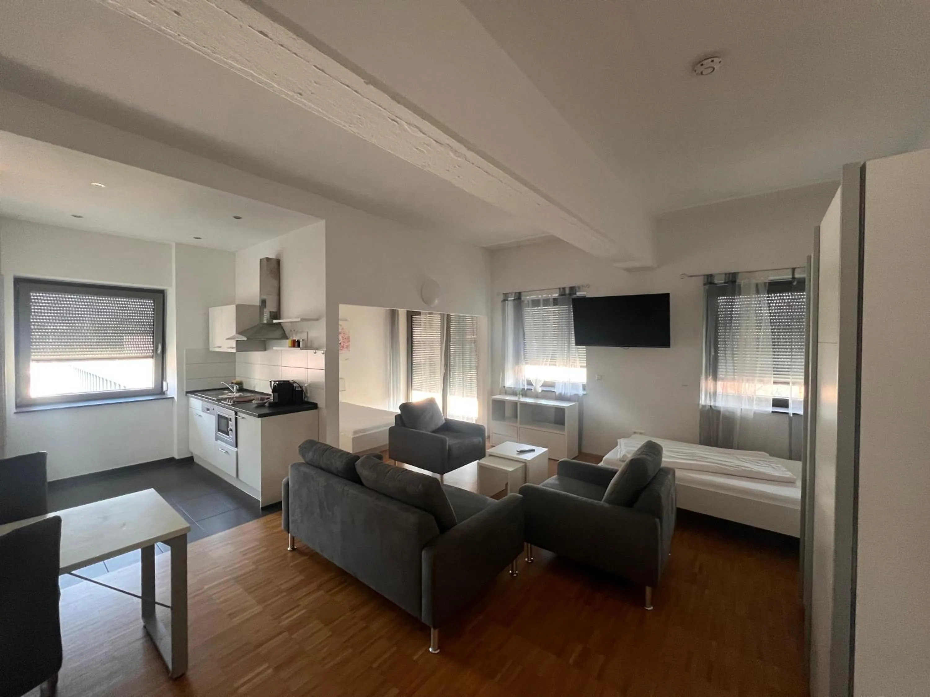 Living room, Bed in New Age Boardinghaus