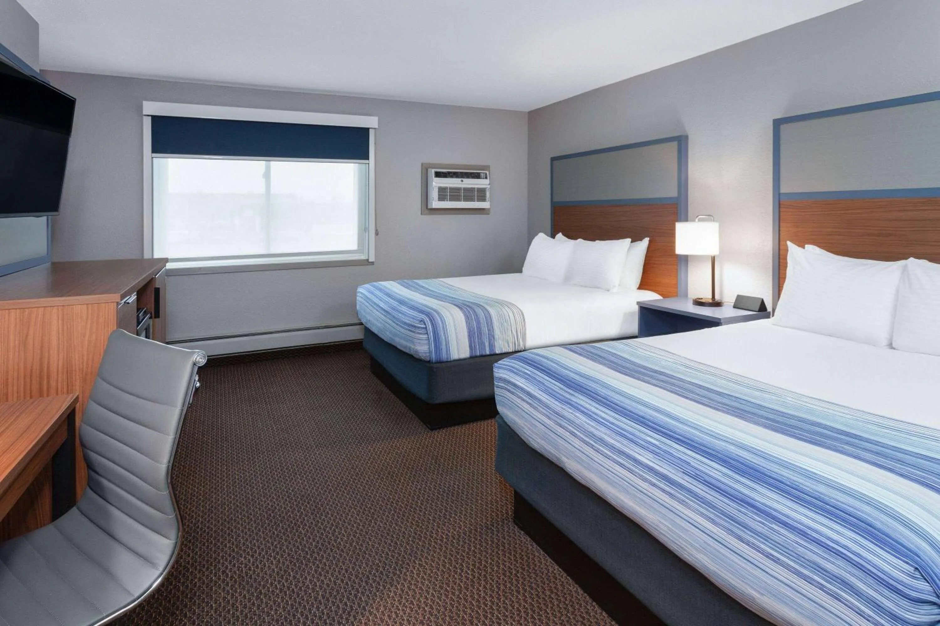 Photo of the whole room, Bed in AmericInn by Wyndham New Richmond