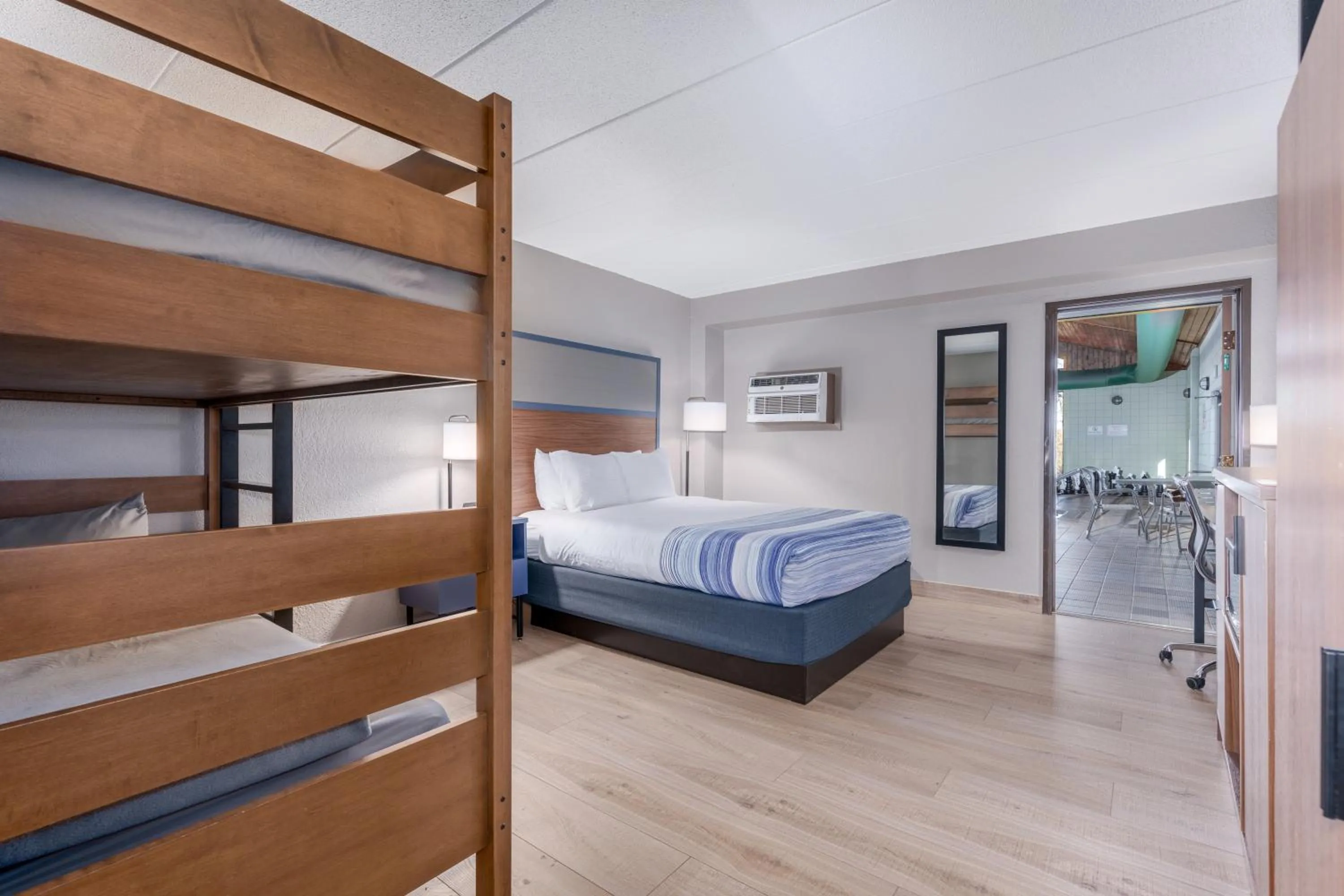 Bed in AmericInn by Wyndham New Richmond