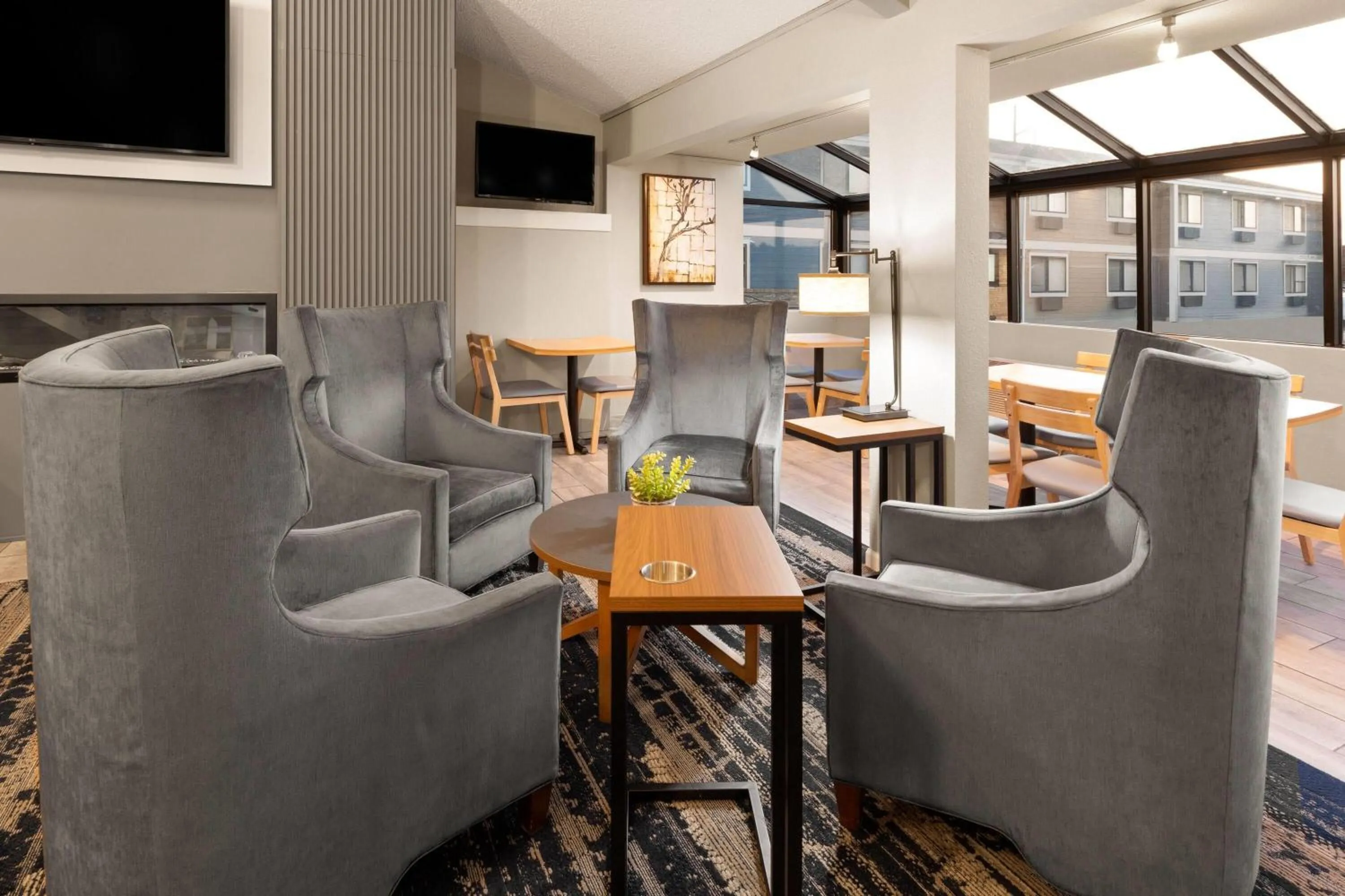 Lobby or reception in AmericInn by Wyndham Chippewa Falls