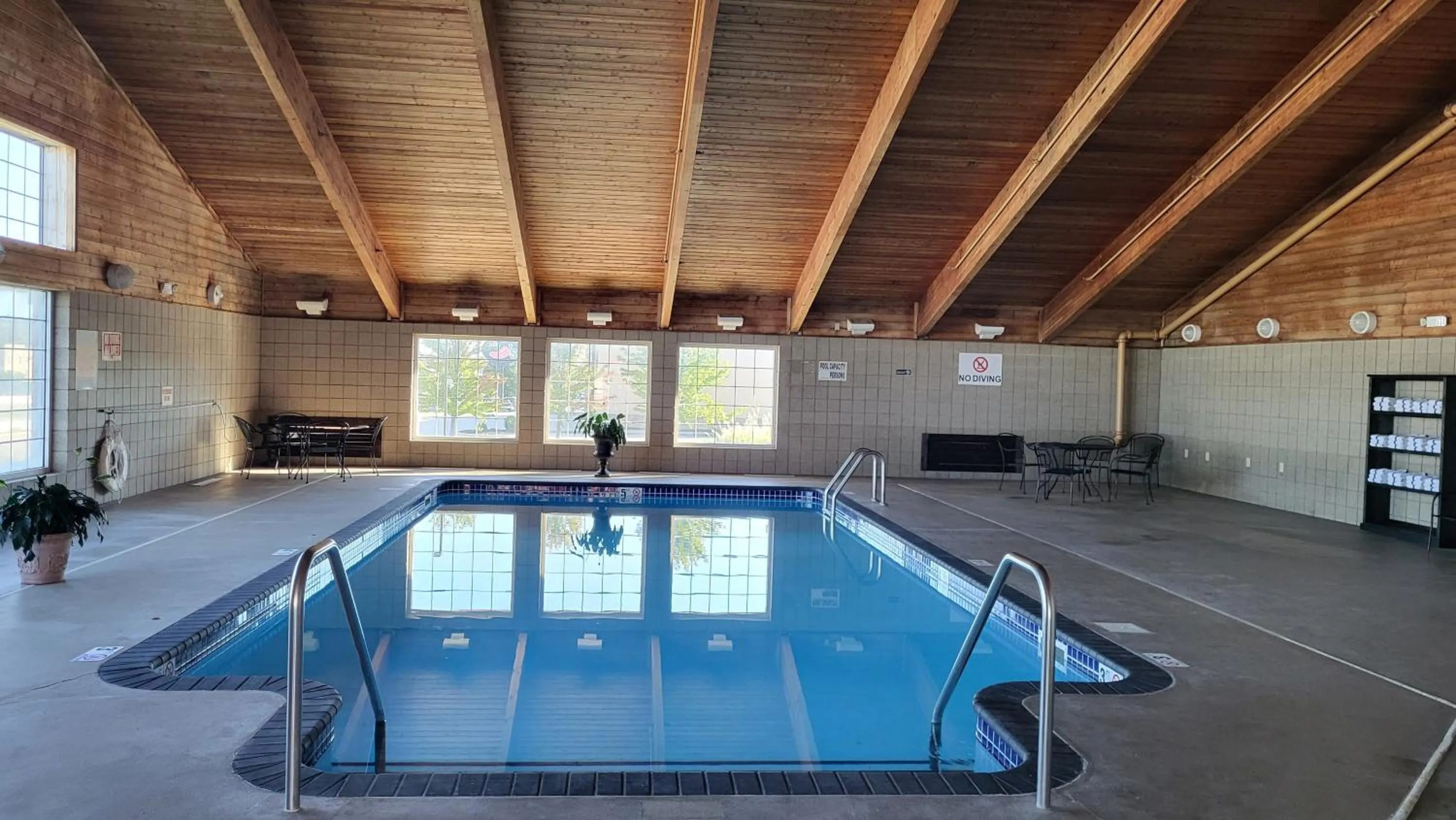 Swimming pool in AmericInn by Wyndham McAlester
