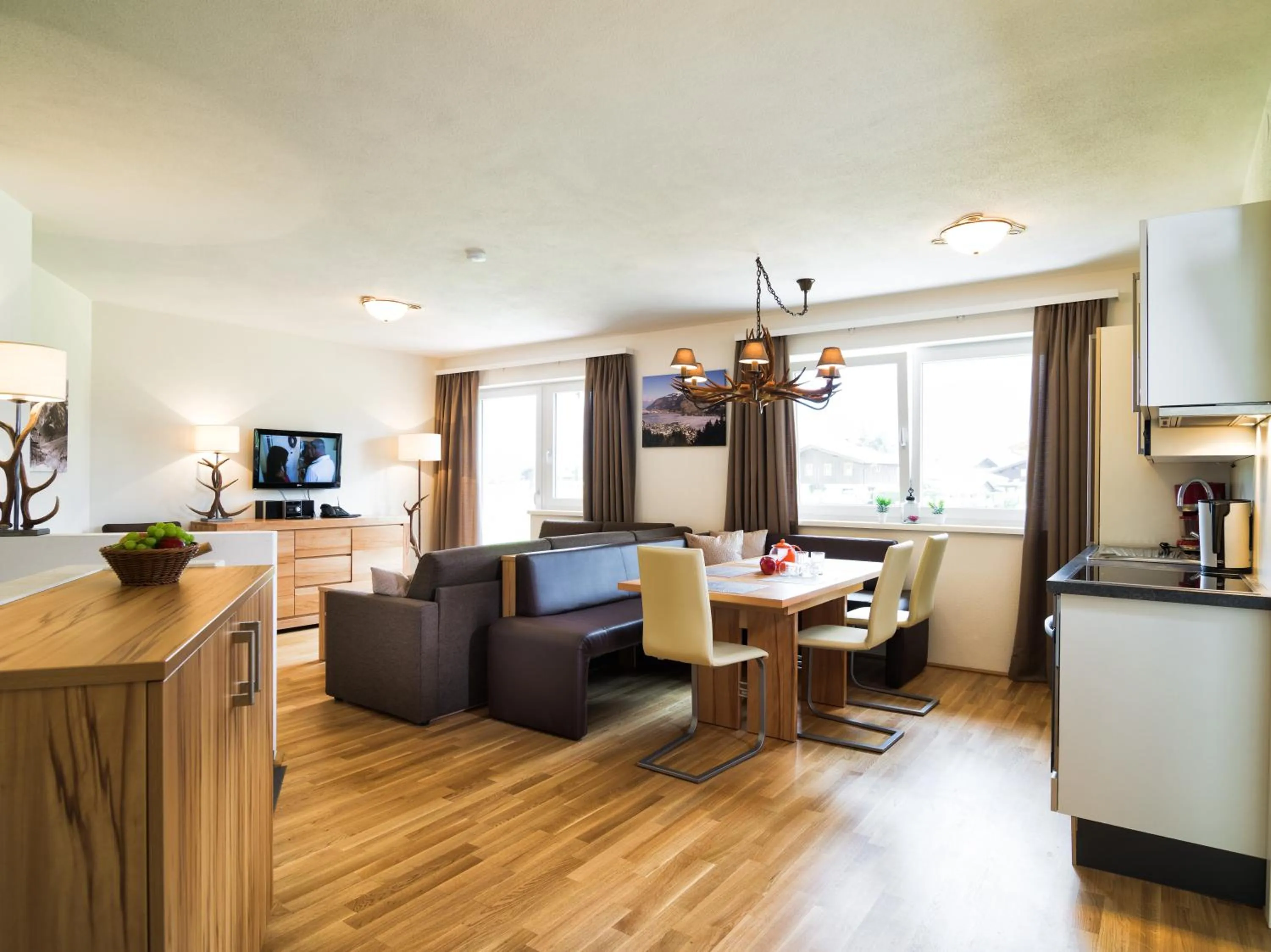 Kitchen or kitchenette in AlpenParks Chalet & Apartment AreitXpress